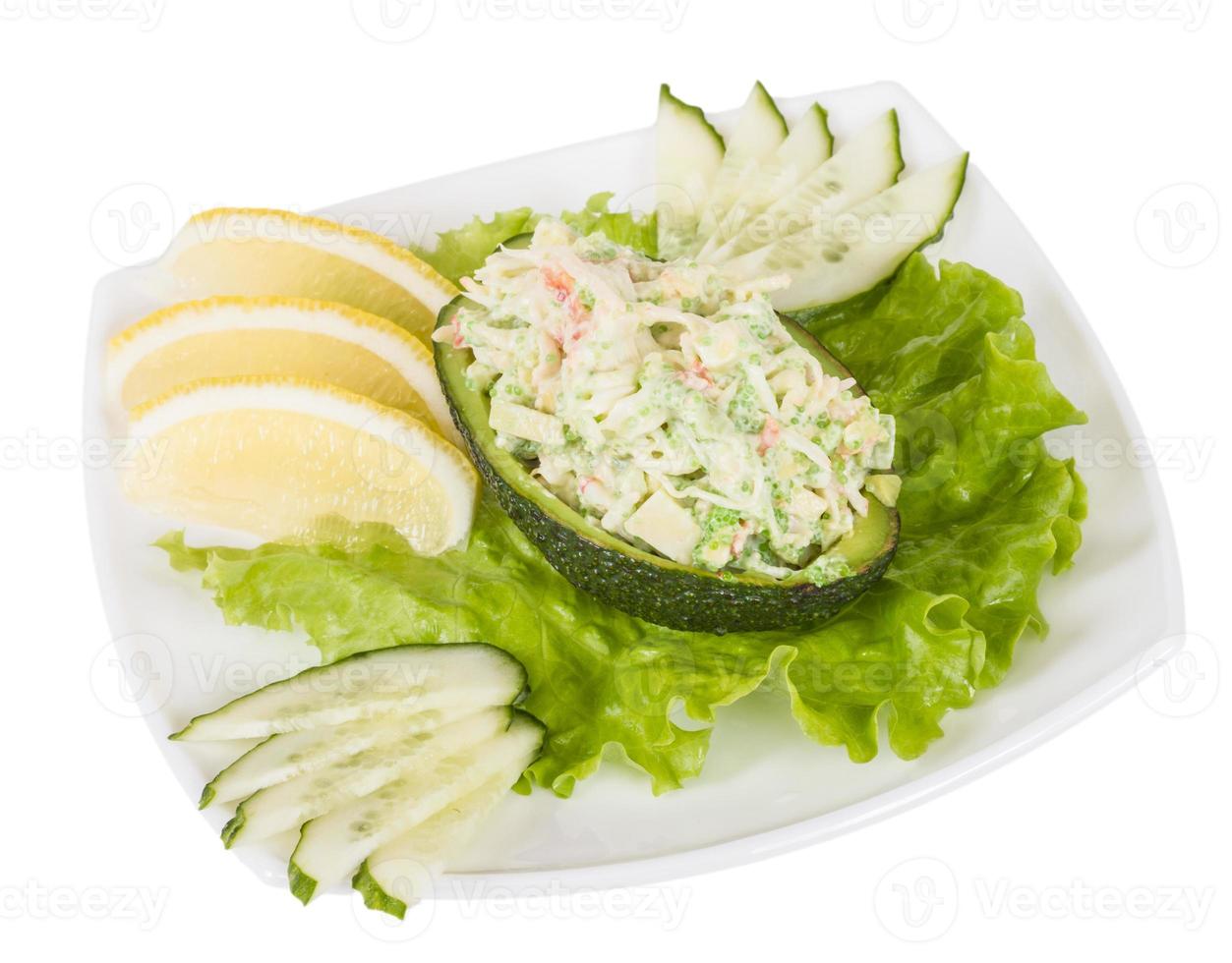 Crab meat salad with green caviar in avocado - japan cusine photo