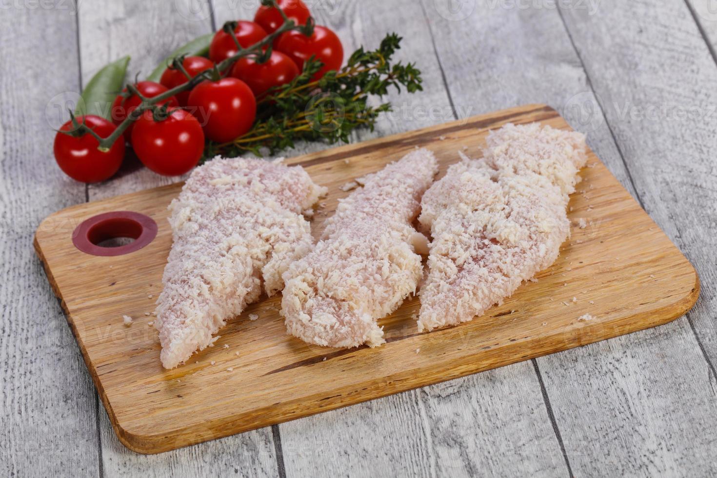 Raw chicken cutlet photo