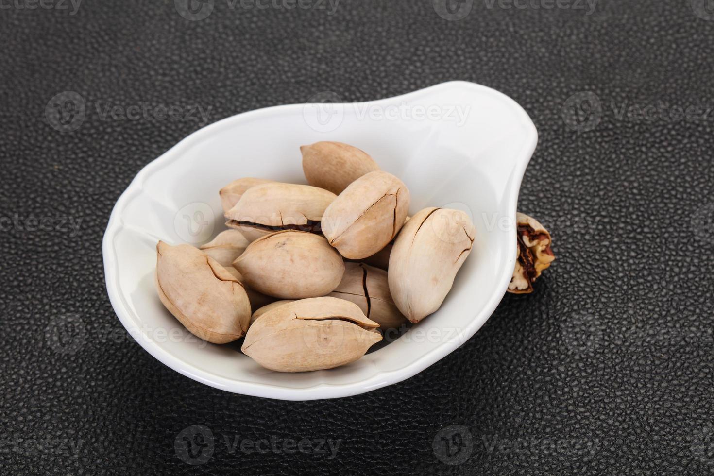 Pecan nuts heap photo
