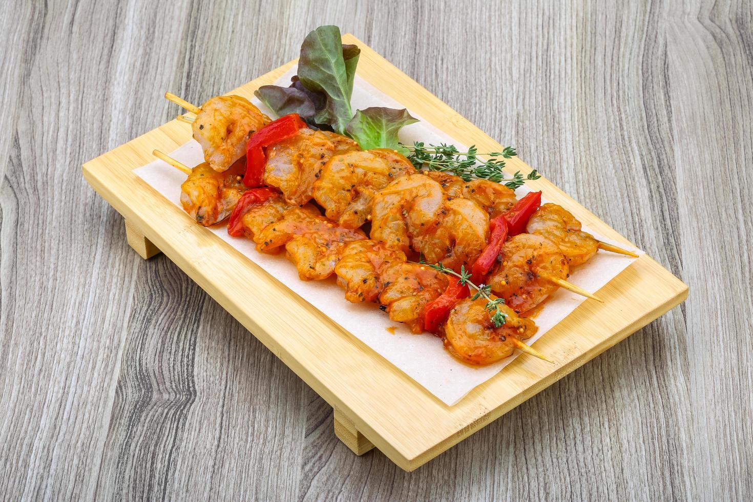 Raw prawn skewer photo