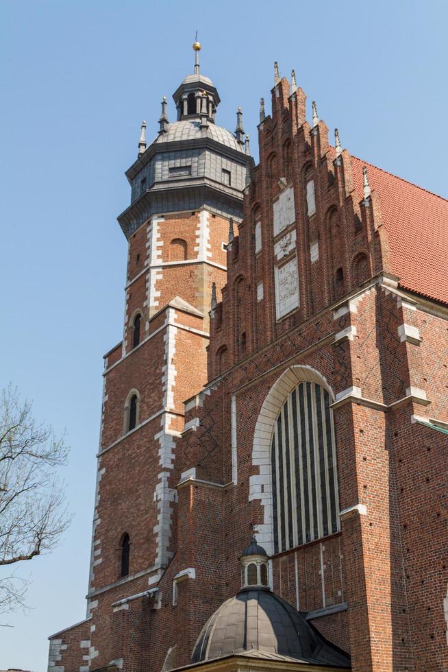 Cracow - Corpus Christi Church was founded by Kasimirus III The Great about 1340. The front elevation has a gothic gable whilst decoration of the interior is baroque photo