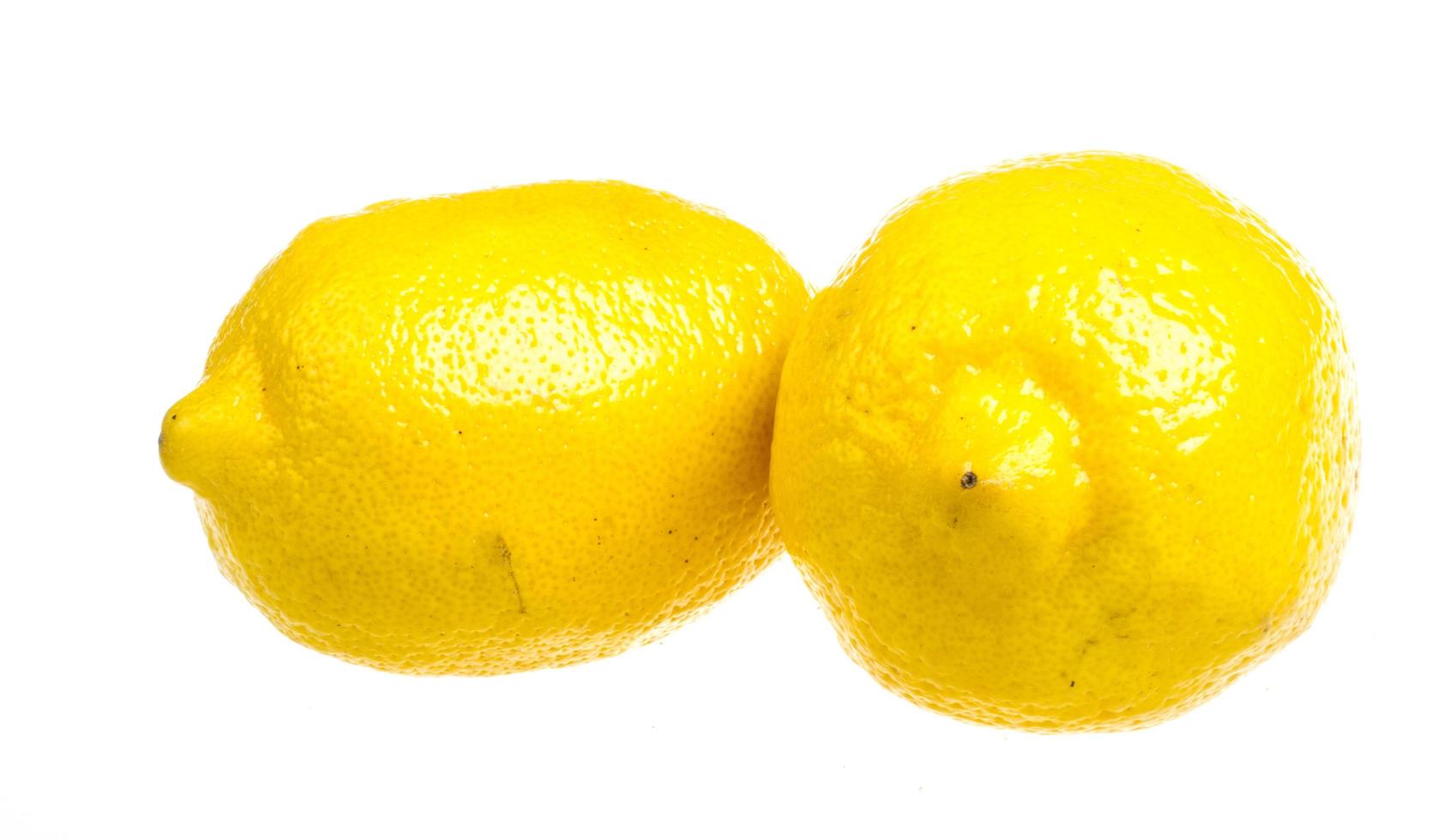 Fresh ripe lemons. Isolated on white background photo