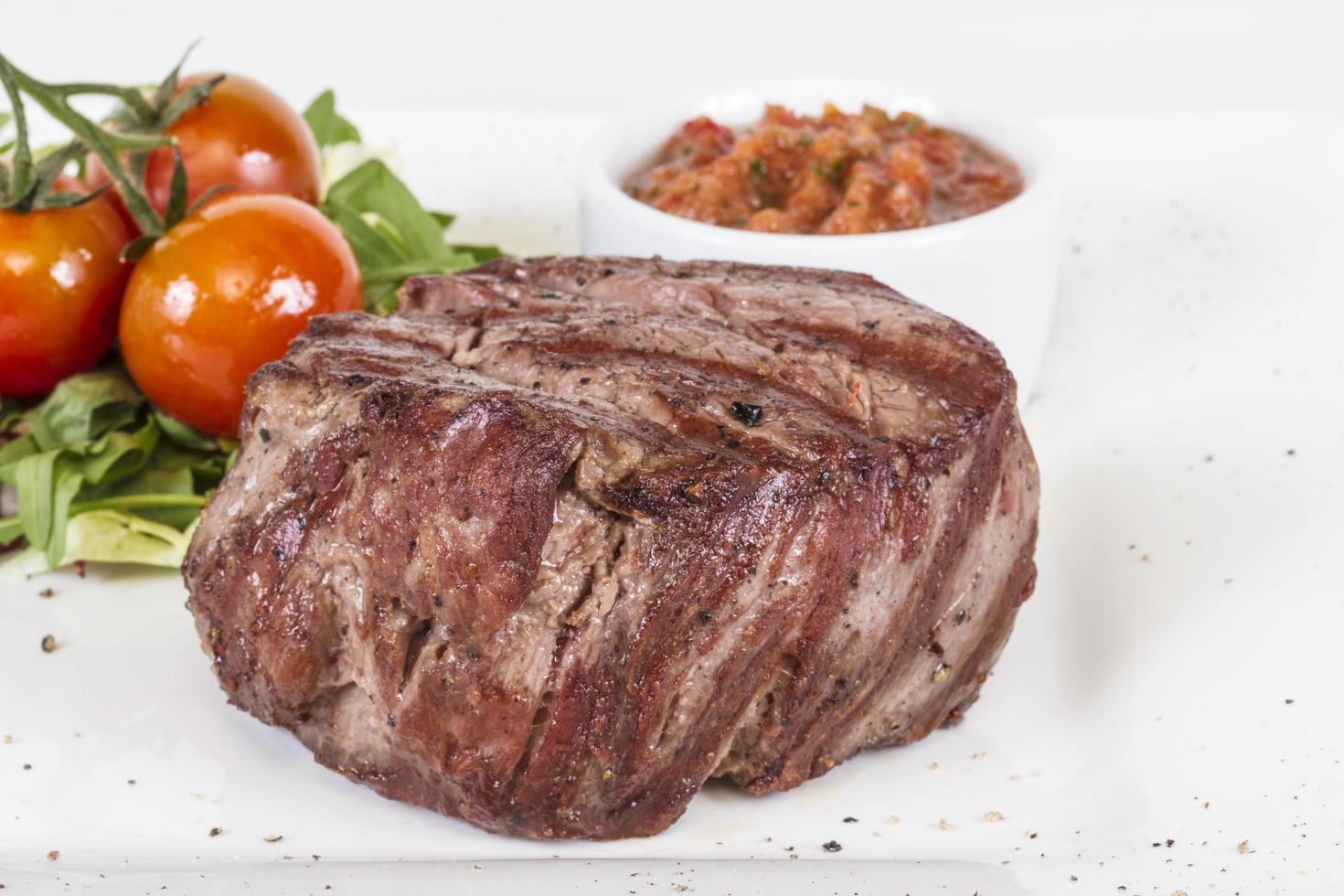 Grilled Beef Steak Isolated On a White Background photo