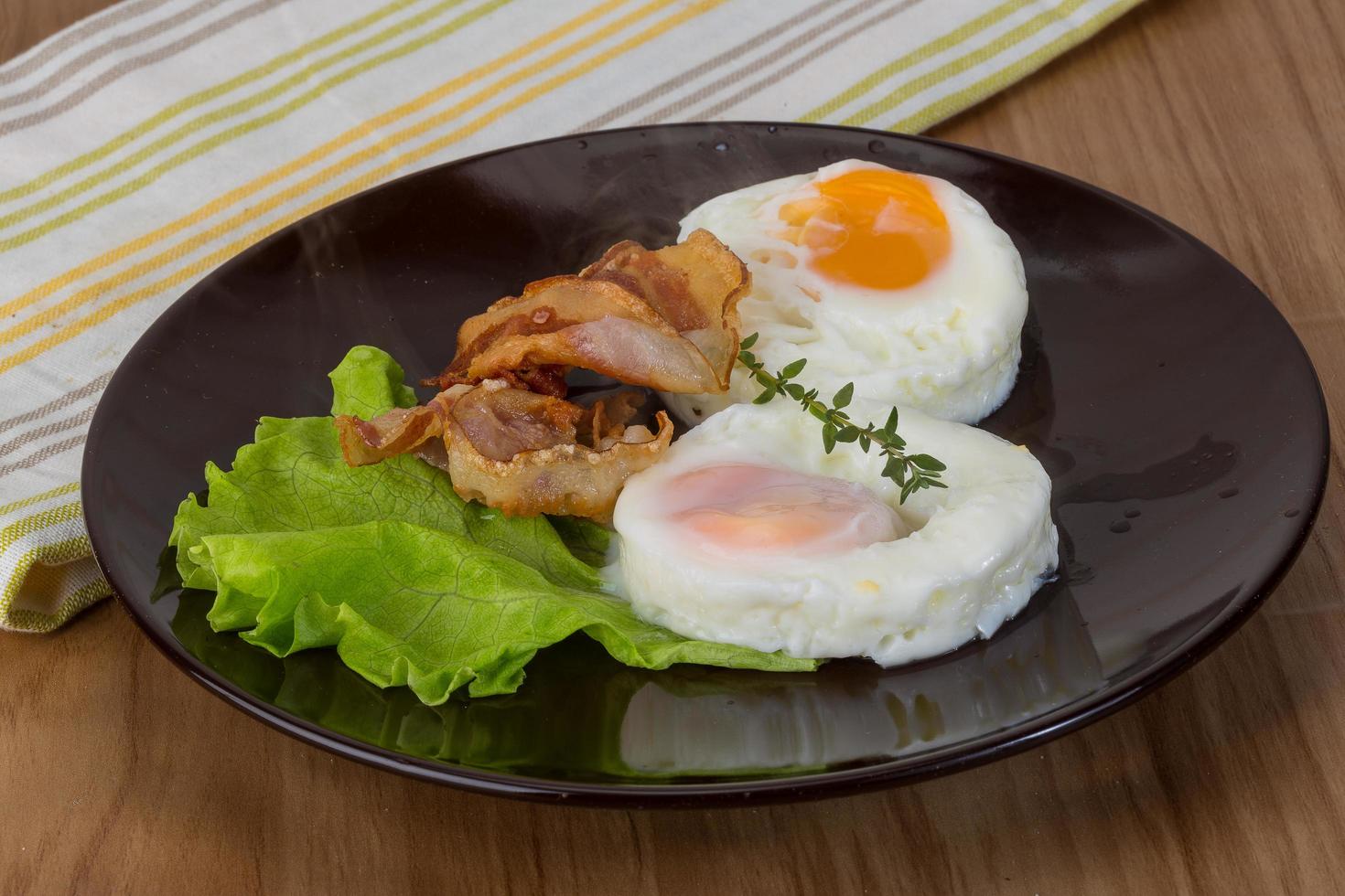 Breakfast with egg and bacon photo