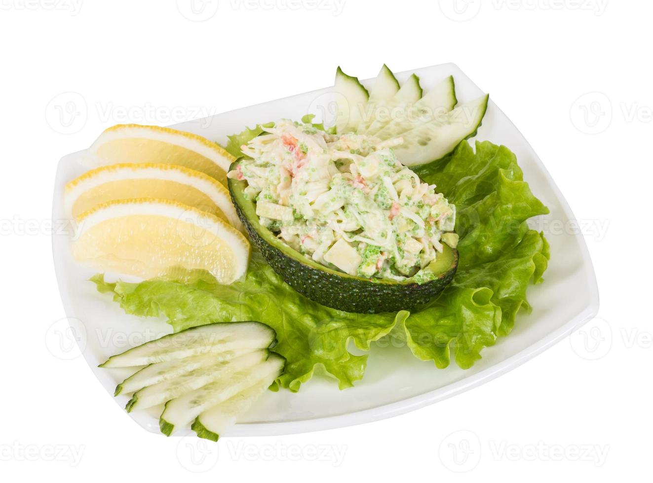 Crab meat salad with green caviar in avocado - japan cusine photo