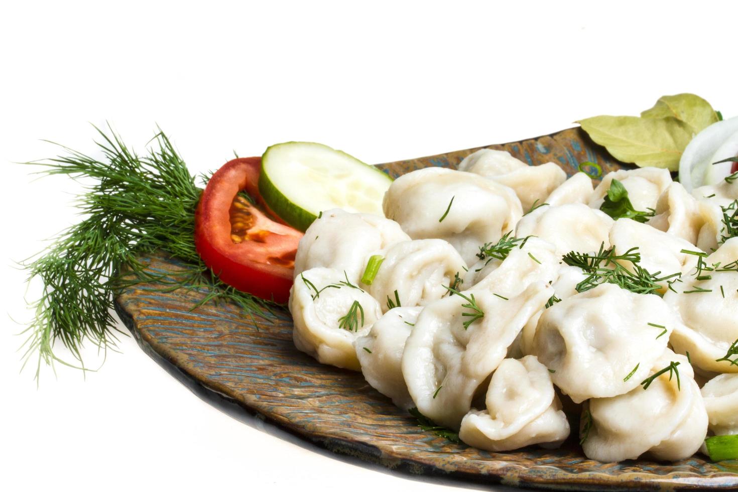 Bowl with traditional russian dish - pelmeni photo