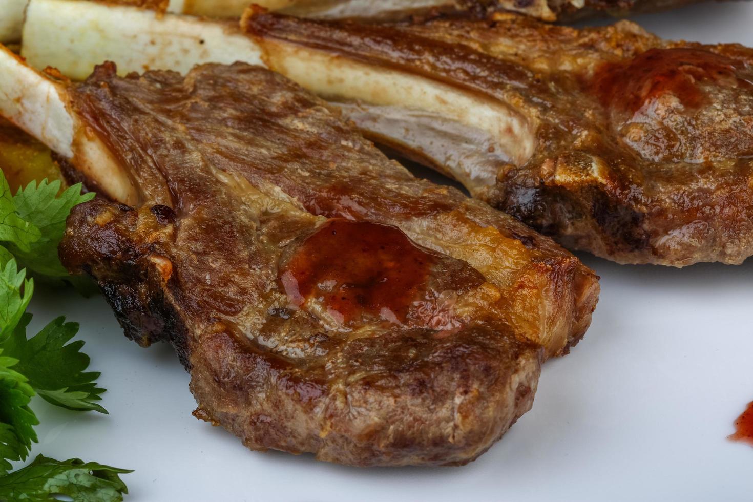 Lamb chops on the plate photo