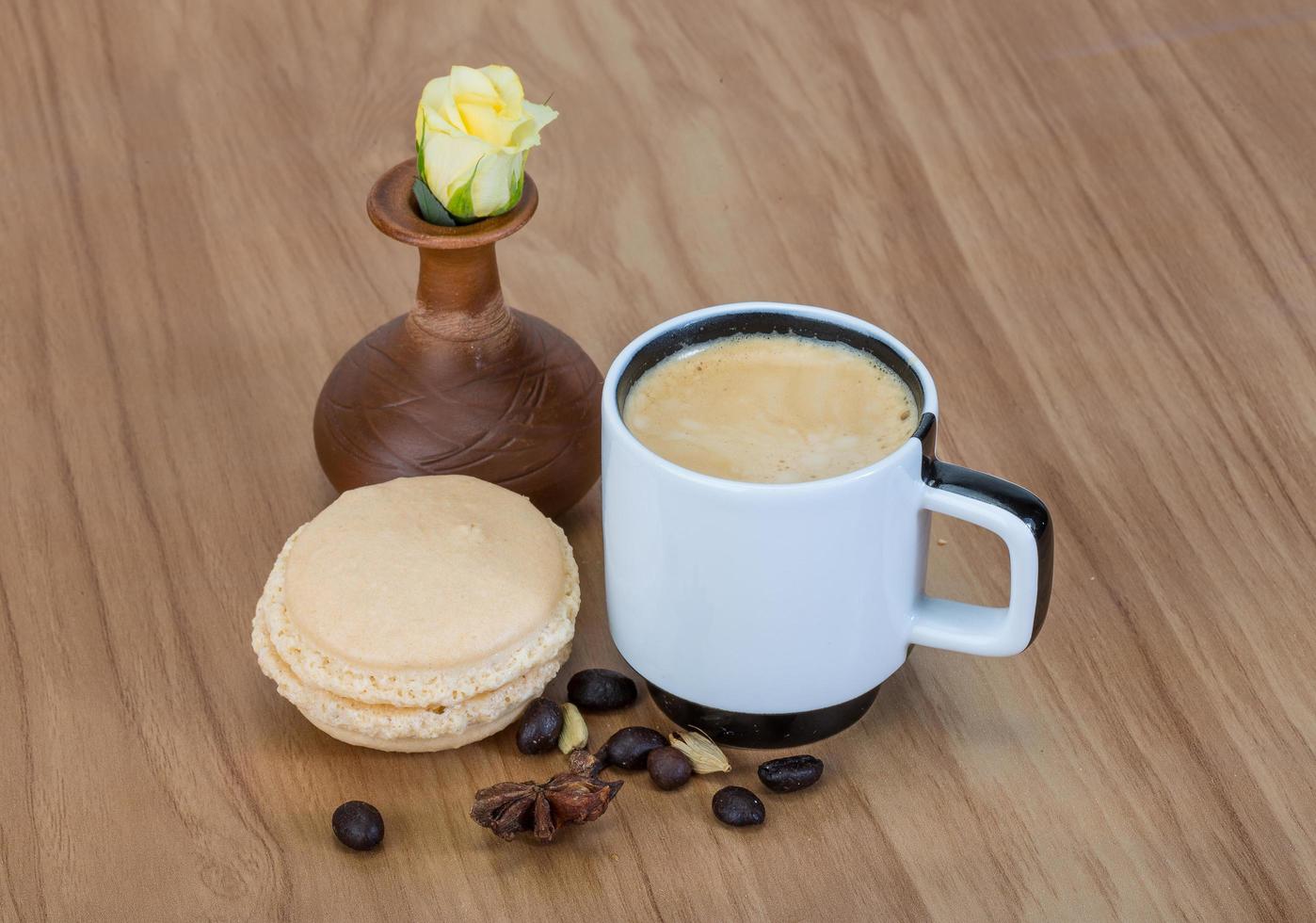 Coffee with macaroons and rose photo