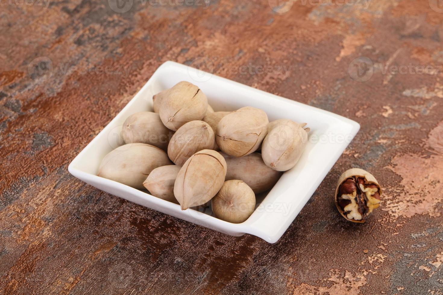 Pecan nuts heap photo