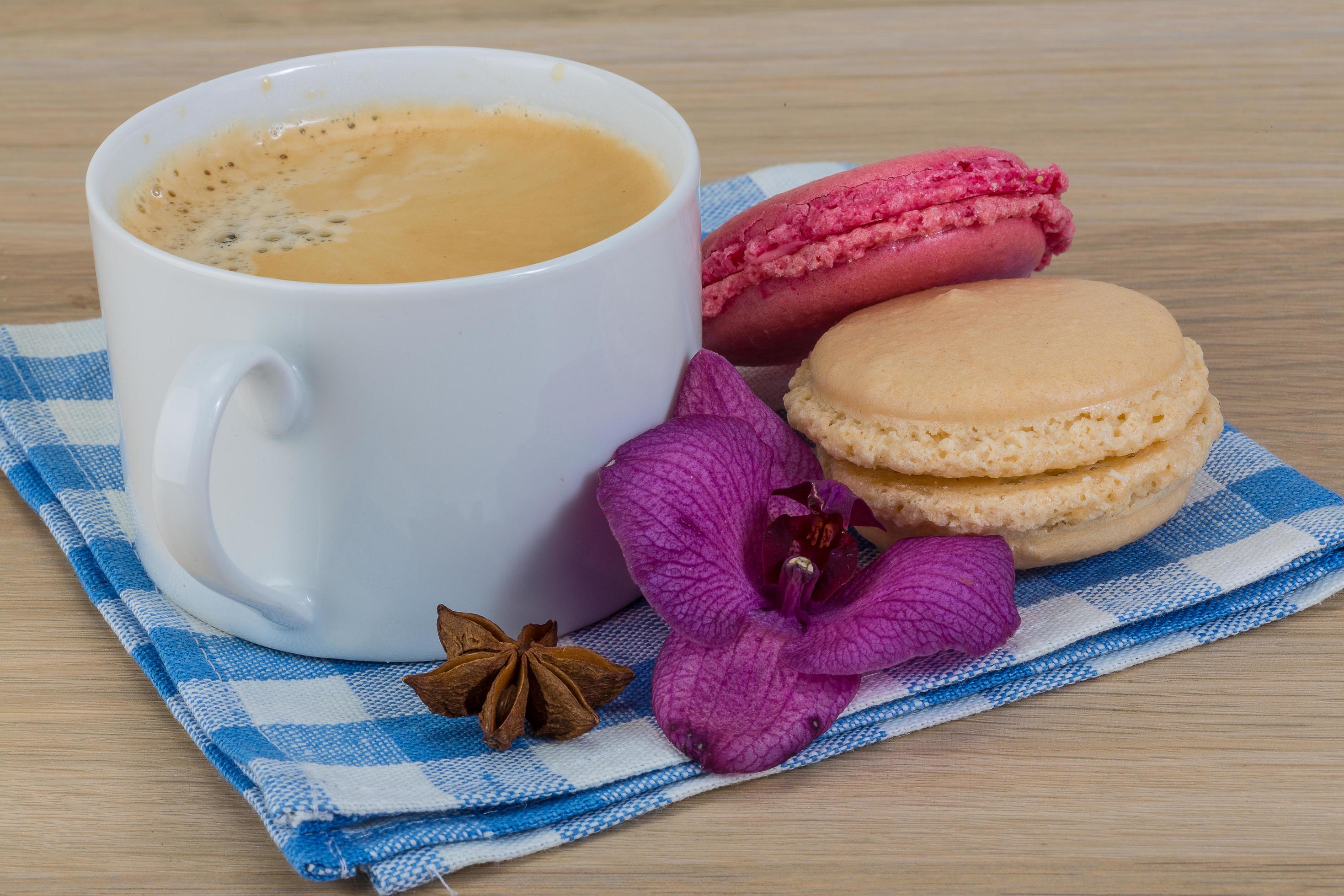 Capuccino with macaroons 12282477 Stock Photo at Vecteezy