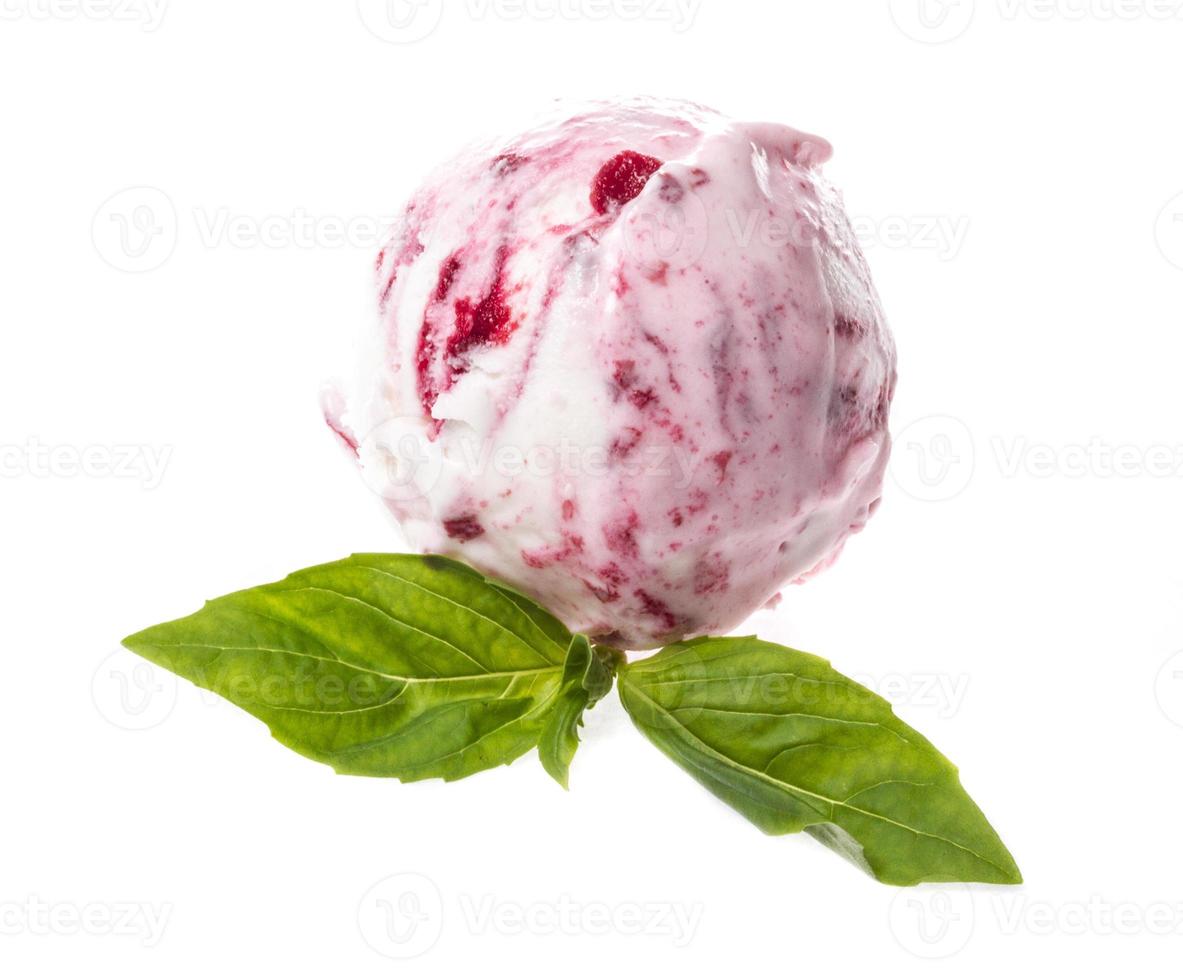 Scoop of strawberry ice cream from top on white background photo