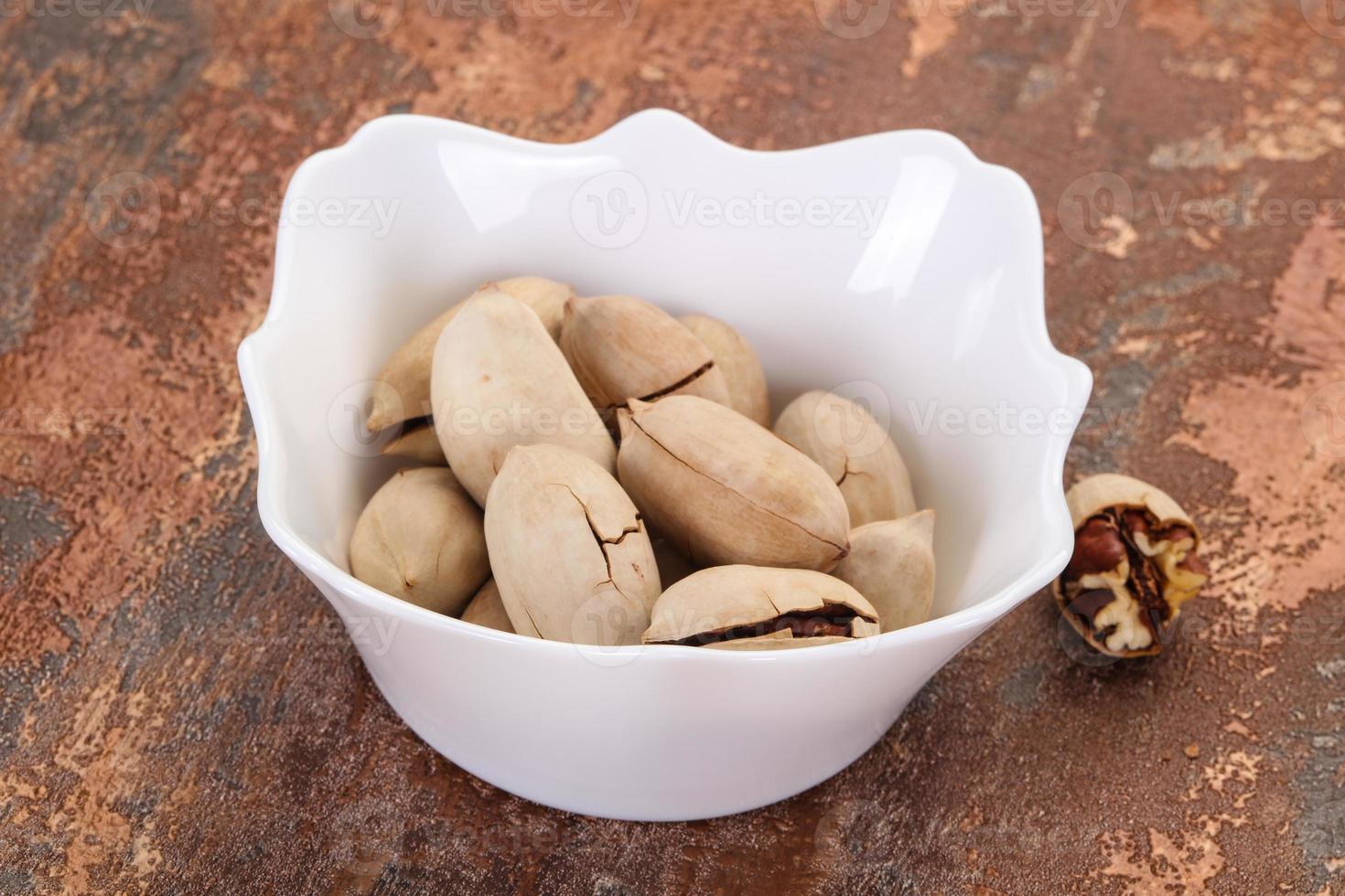 Pecan nuts heap photo