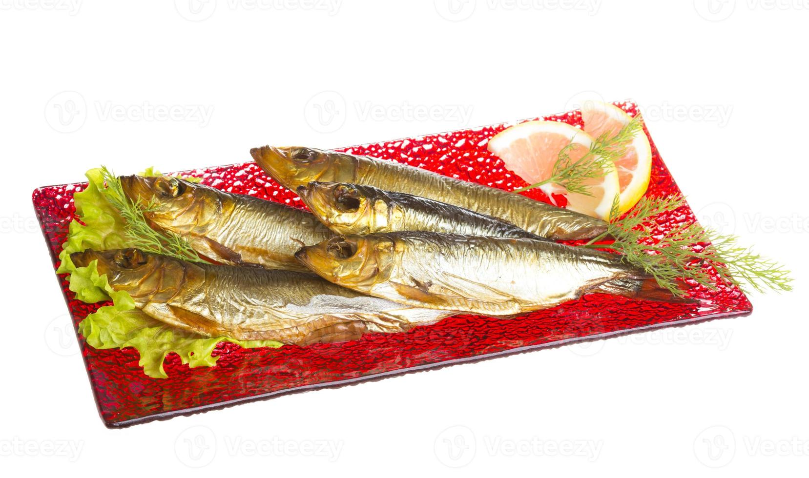 Smoked sprat - appetizing snack photo