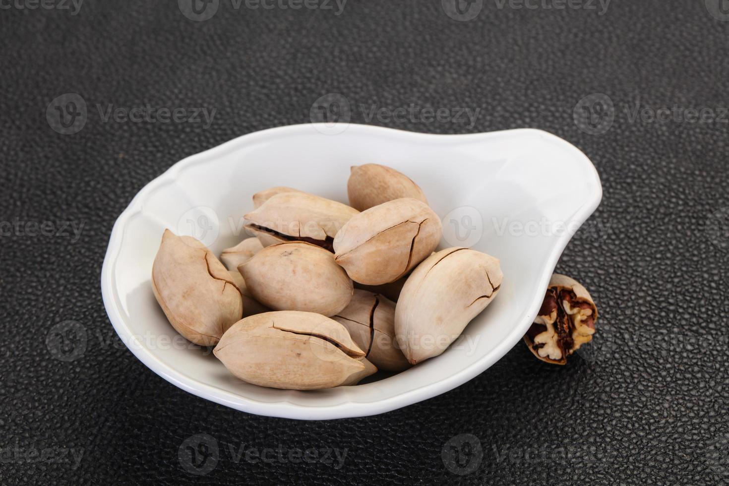 Pecan nuts heap photo