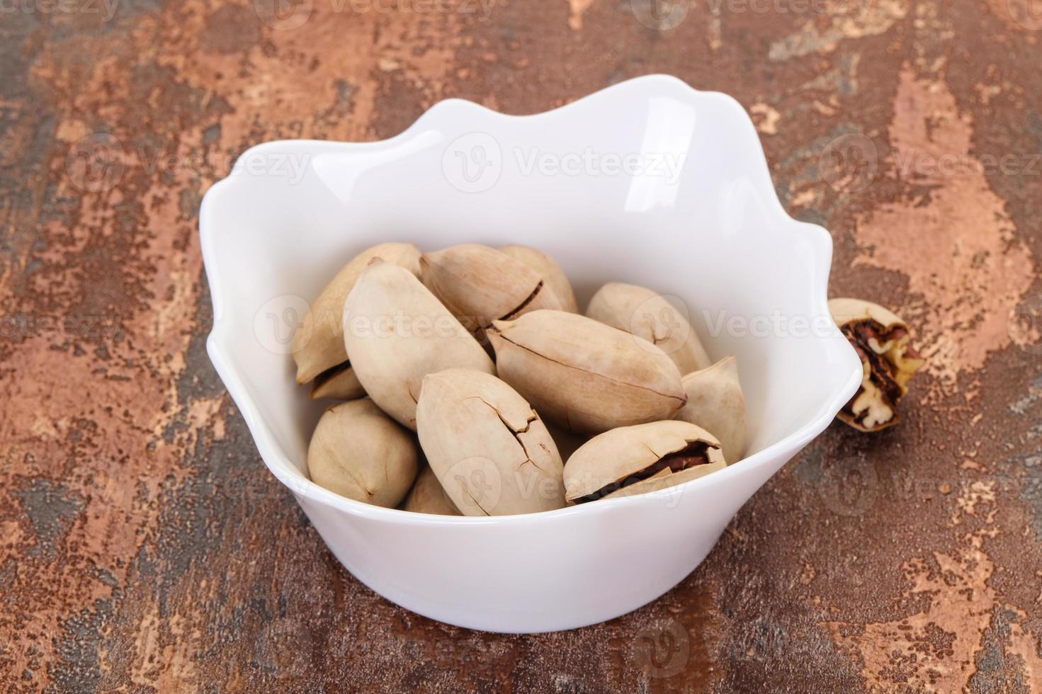 Pecan nuts heap photo