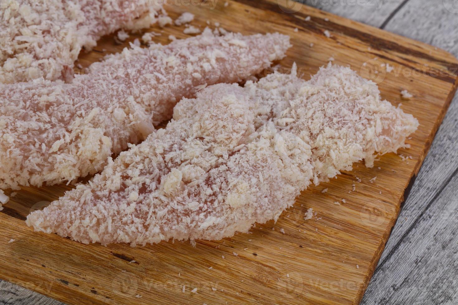 Raw chicken cutlet photo