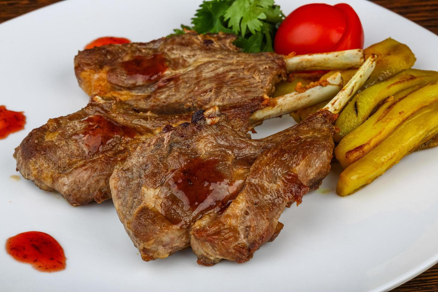 Lamb chops on the plate photo