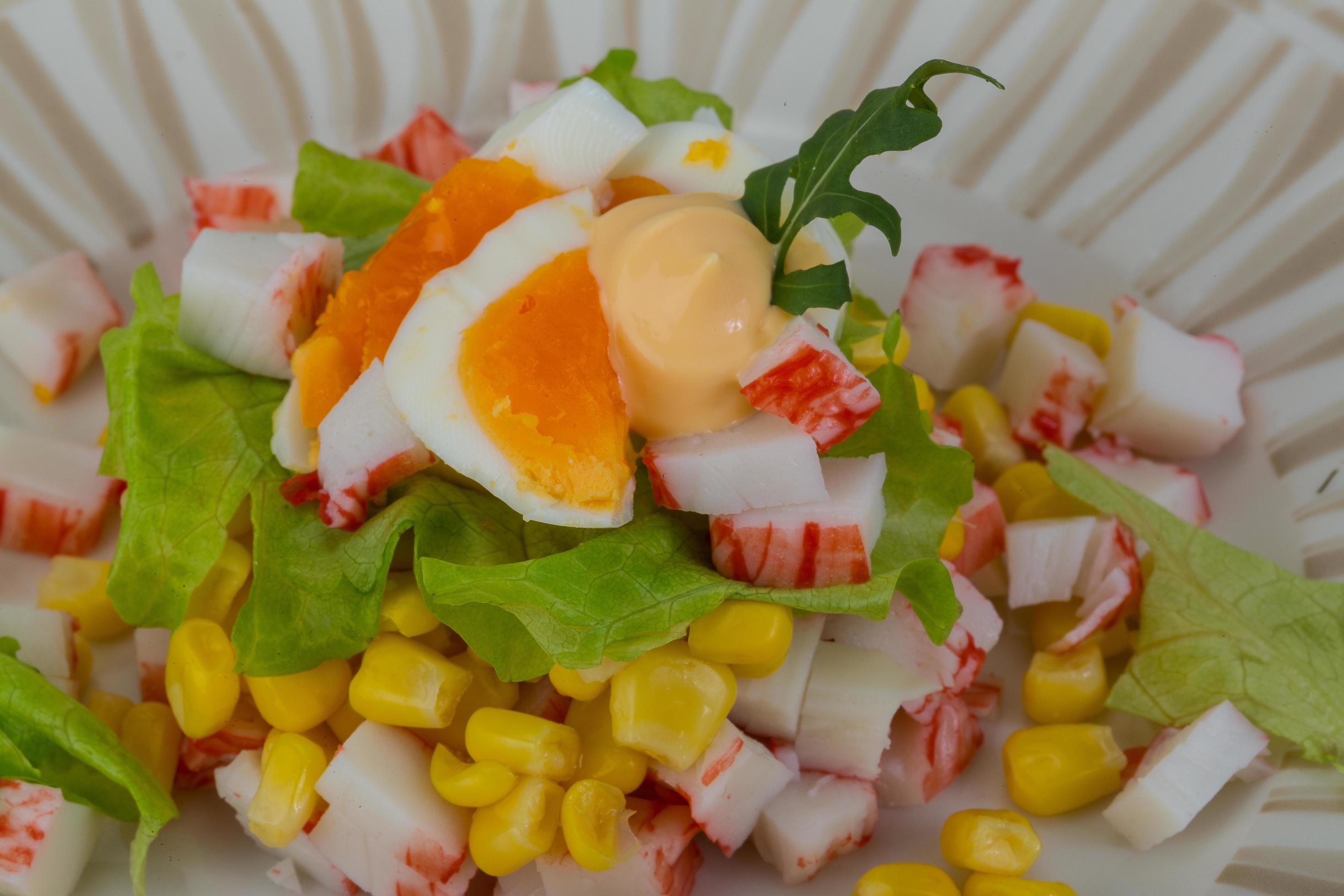 Crab sticks salad 12285958 Stock Photo at Vecteezy