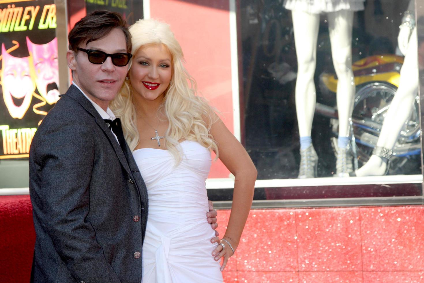 LOS ANGELES  NOV 15 - Director Steve Antin, Christina Aguilera at the Hollywood Walk of Fame Star Ceremony for Christina Aguilera at Hard Rock Cafe Sidewalk, Hollywood and Highland on November 15, 2010 in Los Angeles, CA photo