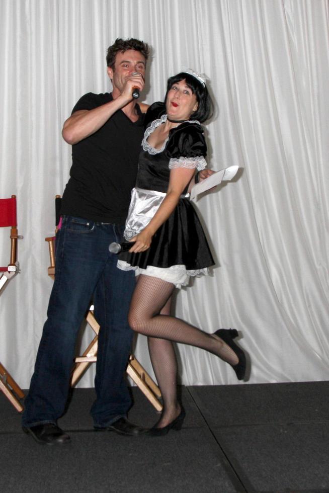 LOS ANGELES, AUG 27 -  Daniel Goddard with Singing Telegram Actress getting Birthday Greetings from Fans that hired her attending the Daniel Goddard Fan Event 2011 at the Universal Sheraton Hotel on August 27, 2011 in Los Angeles, CA photo