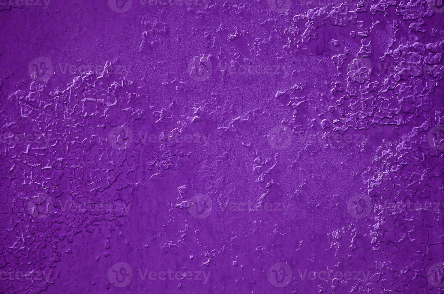 Texture of a metal wall with an old paint coating that spoils under the influence of time and weather photo