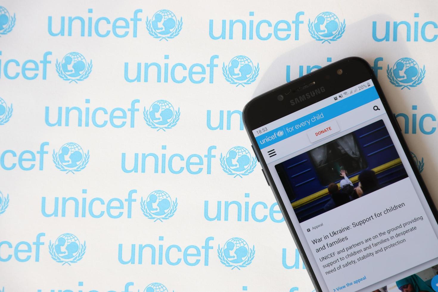 TERNOPIL, UKRAINE - MAY 2, 2022 UNICEF official website on smartphone screen - United Nations programm that provides humanitarian and developmental assistance to children photo