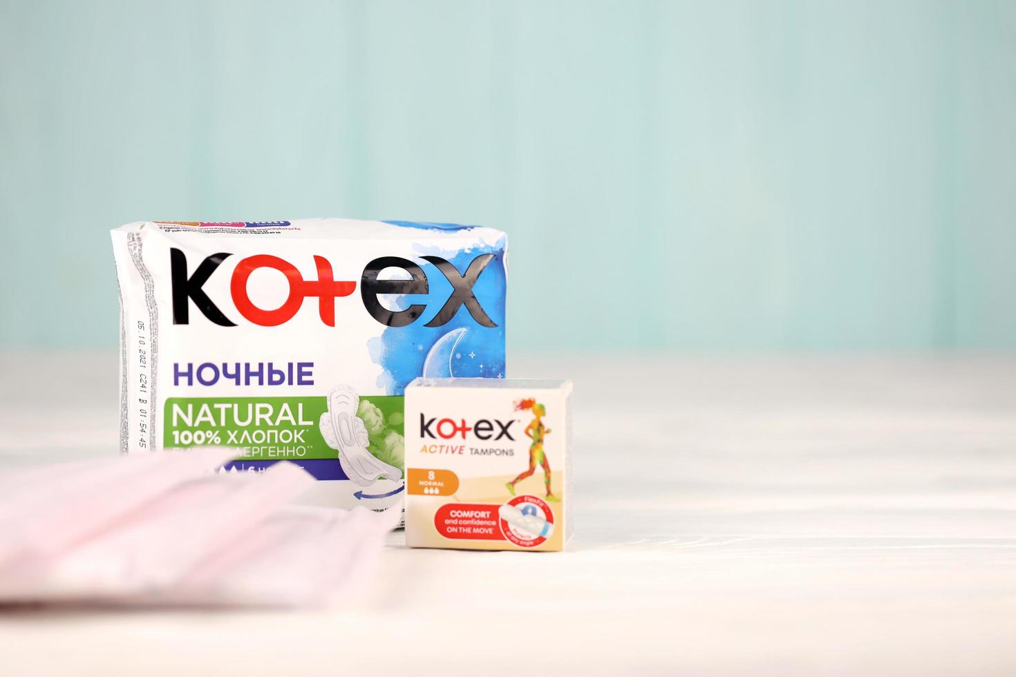 KHARKIV, UKRAINE - DECEMBER 16, 2021 Kotex production with logo. Kotex is a brand of feminine hygiene products, includes maxi, thin and ultra thin pads. photo