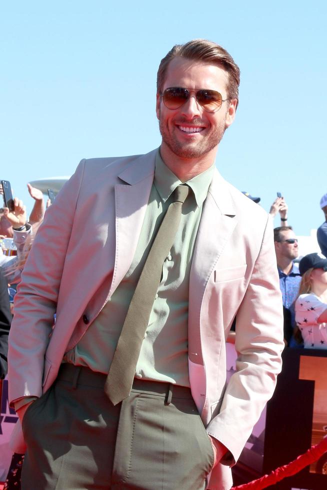 LOS ANGELES  MAY 4 - Glen Powell at the Top Gun - Maverick World Premiere at USS Midway on May 4, 2022 in San Diego, CA photo