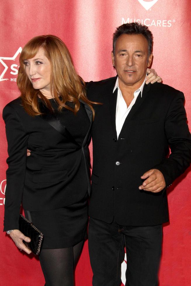 LOS ANGELES, FEB 8 - Patti Scialfa, Bruce Springsteen arrives at the 2013 MusiCares Person Of The Year Gala Honoring Bruce Springsteen at the Los Angeles Convention Center on February 8, 2013 in Los Angeles, CA photo