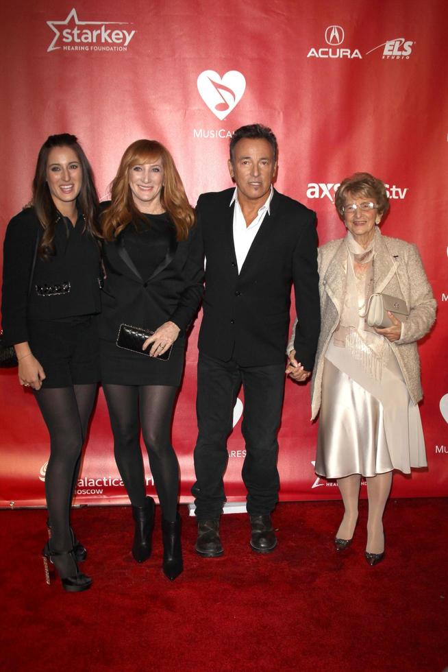 LOS ANGELES, FEB 8 - Jessica Springsteen, Patti Scialfa, Bruce Springsteen, Adele Springsteen arrives at the 2013 MusiCares Person Of The Year Gala Honoring Bruce Springsteen at the Los Angeles Convention Center on February 8, 2013 in Los Angeles, CA photo