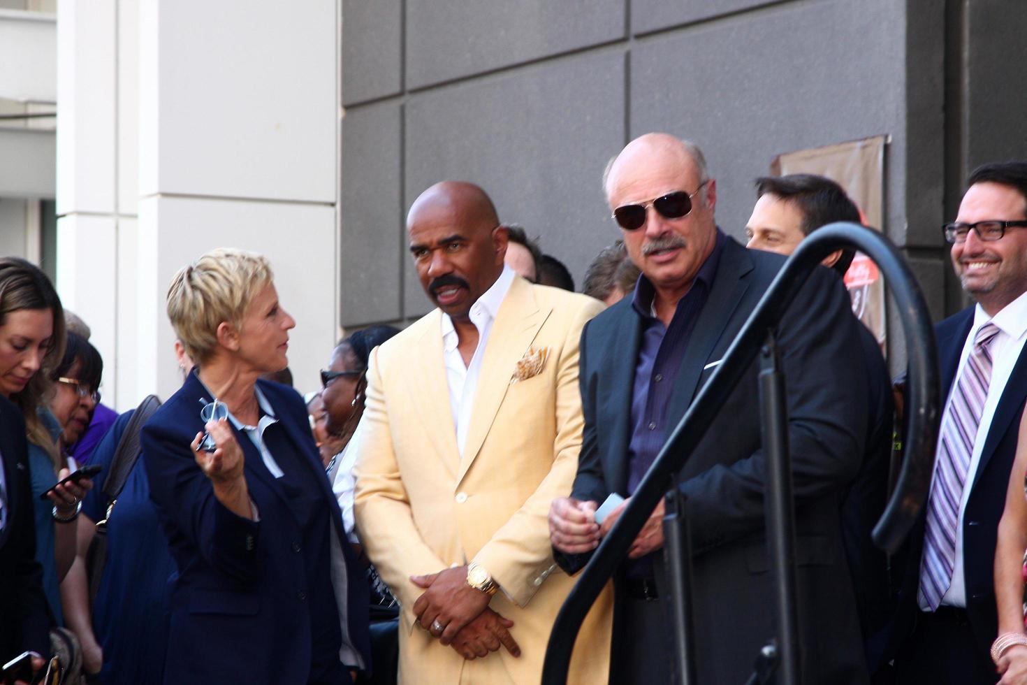 LOS ANGELES, MAY 13 - Ellen DeGeneres, Steve Harvey, Dr. Phil McGraw at the Steve Harvey Hollywood Walk of Fame Star Ceremony at the W Hollywood Hotel on May 13, 2013 in Los Angeles, CA photo