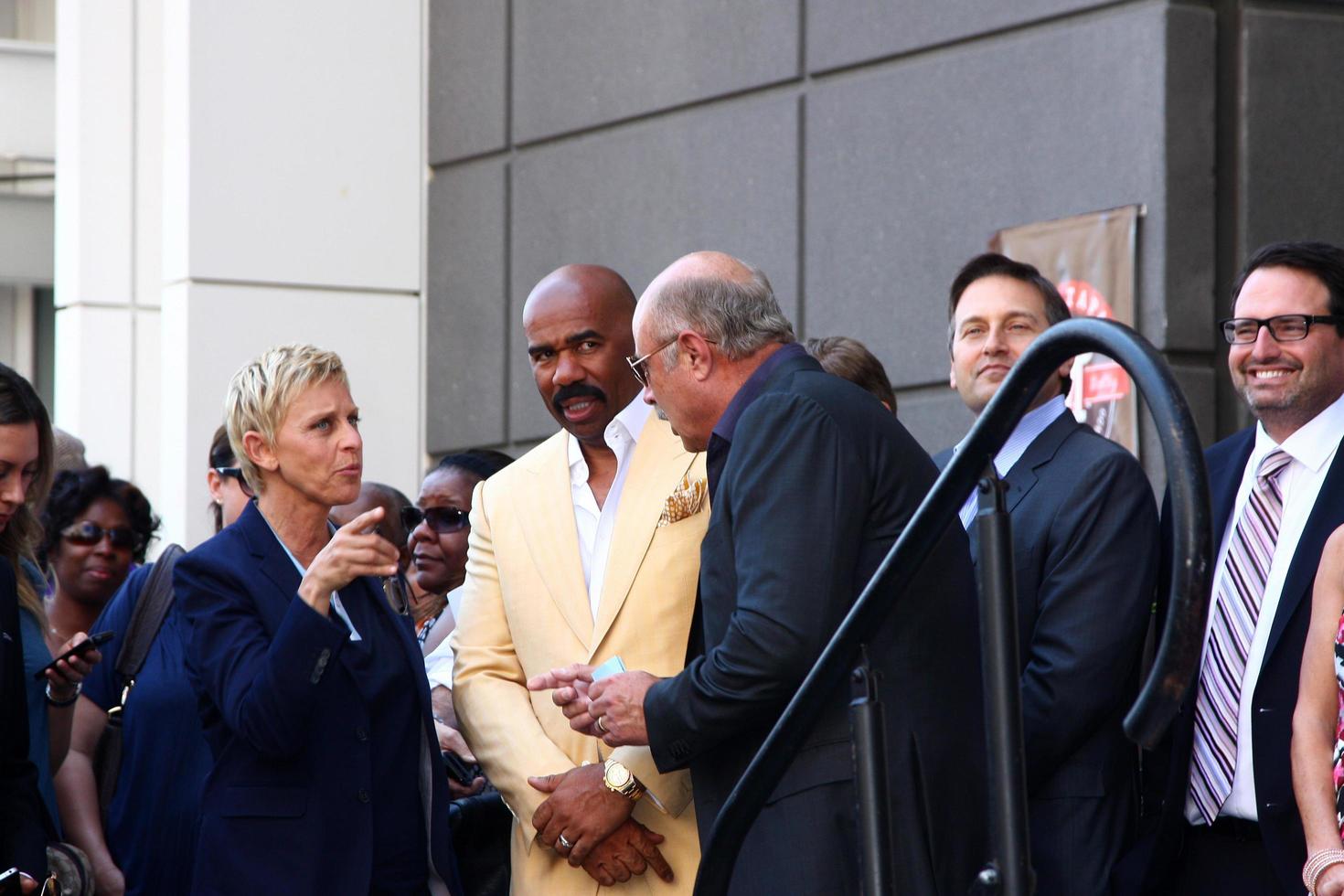 LOS ANGELES, MAY 13 - Ellen DeGeneres, Steve Harvey, Dr. Phil McGraw at the Steve Harvey Hollywood Walk of Fame Star Ceremony at the W Hollywood Hotel on May 13, 2013 in Los Angeles, CA photo