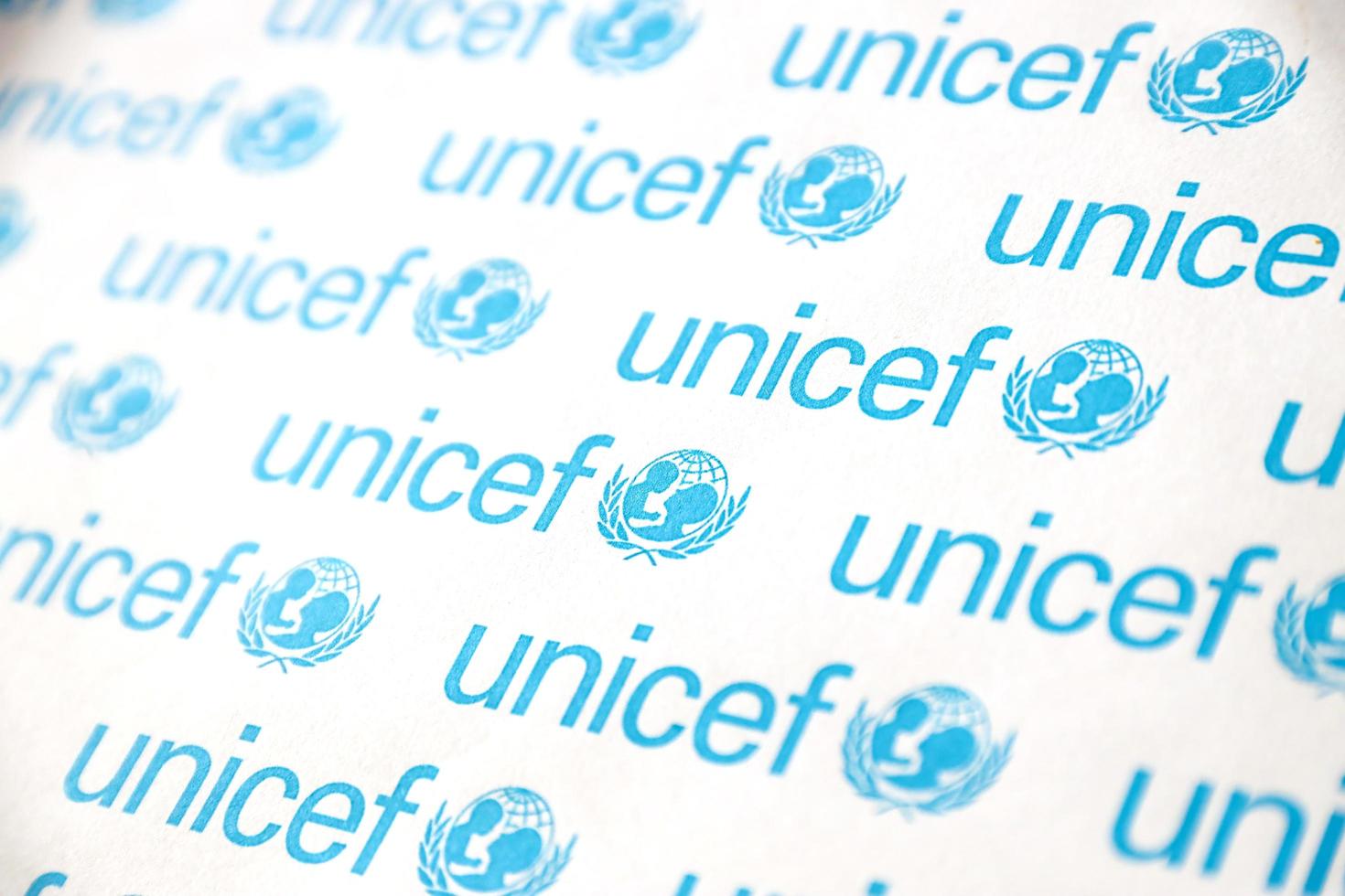 TERNOPIL, UKRAINE - MAY 2, 2022 Unicef logo on paper. Unicef is a United Nations programm that provides humanitarian and developmental assistance to children and mothers photo