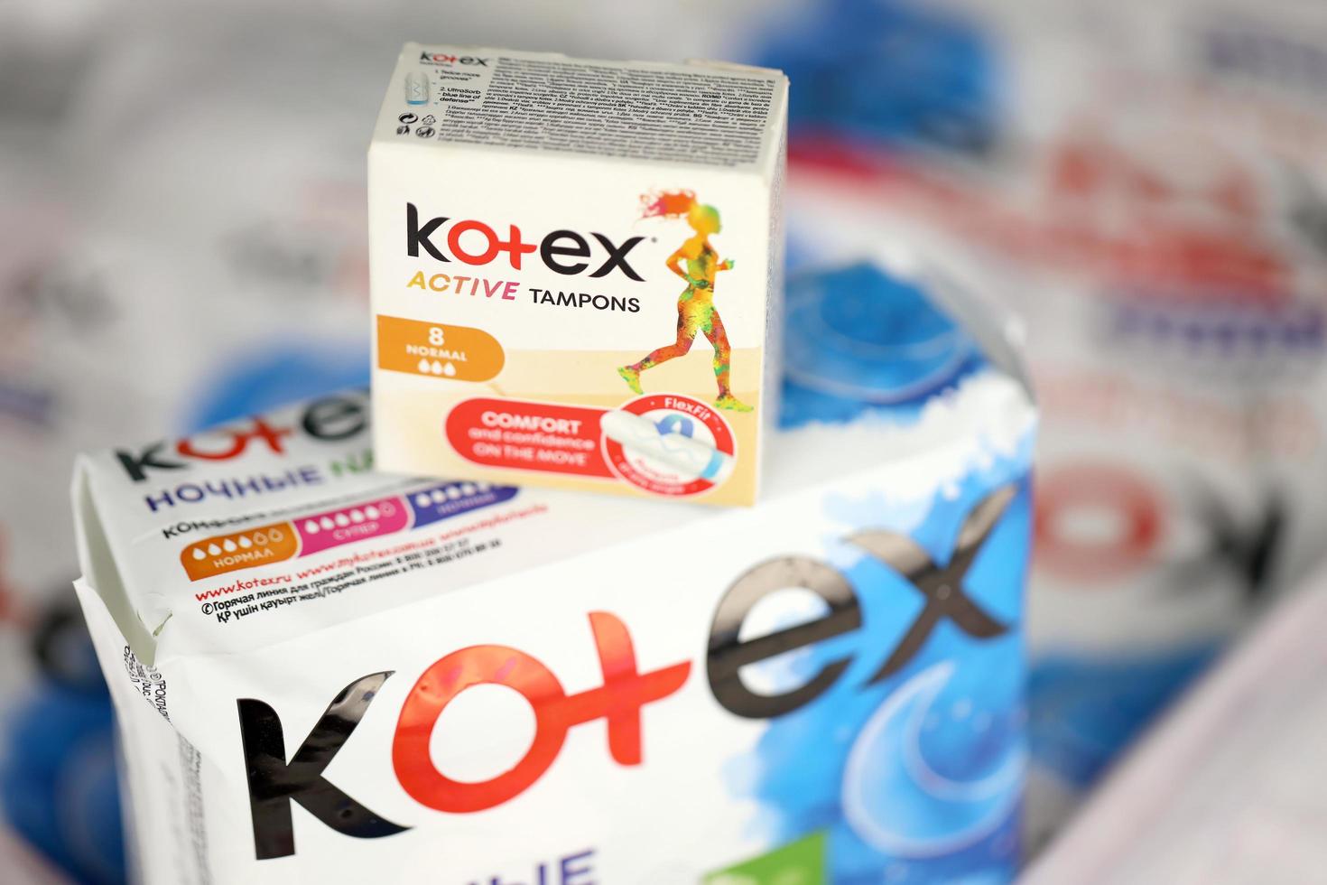 KHARKIV, UKRAINE - DECEMBER 16, 2021 Kotex production with logo. Kotex is a brand of feminine hygiene products, includes maxi, thin and ultra thin pads. photo