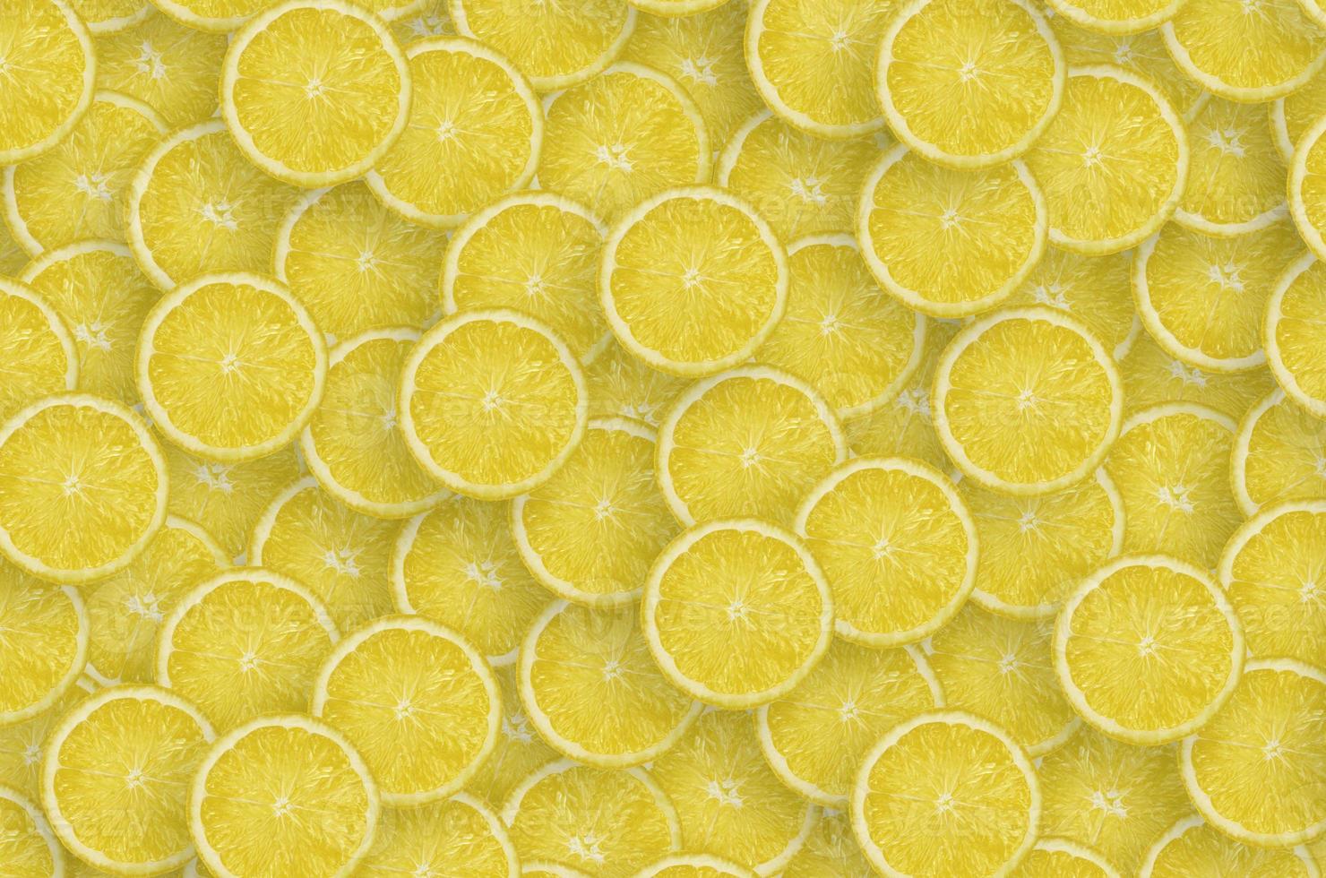 Pattern of yellow lemon citrus slices. Citrus flat lay photo