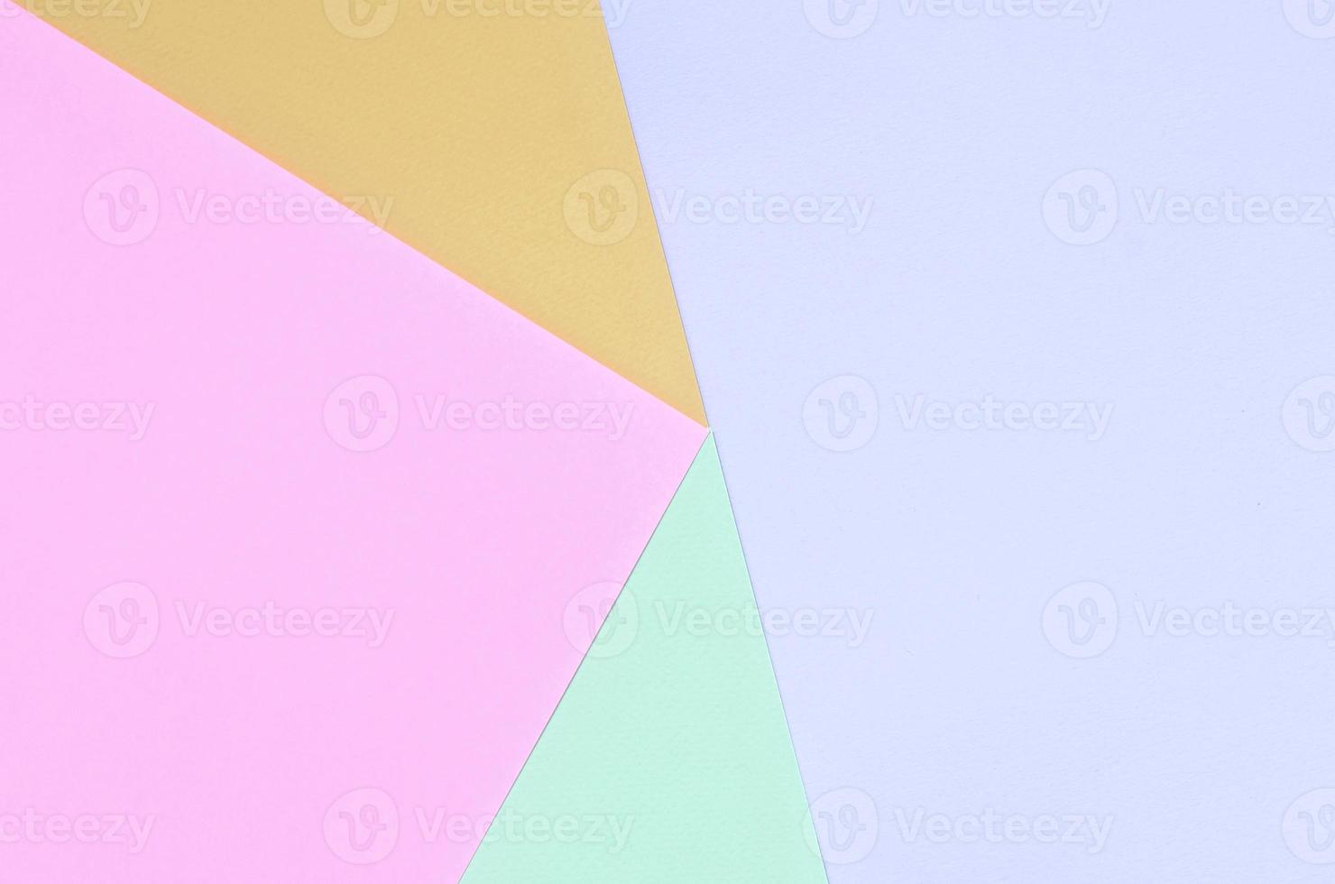 Texture background of fashion pastel colors. Pink, violet, orange and blue geometric pattern papers. photo