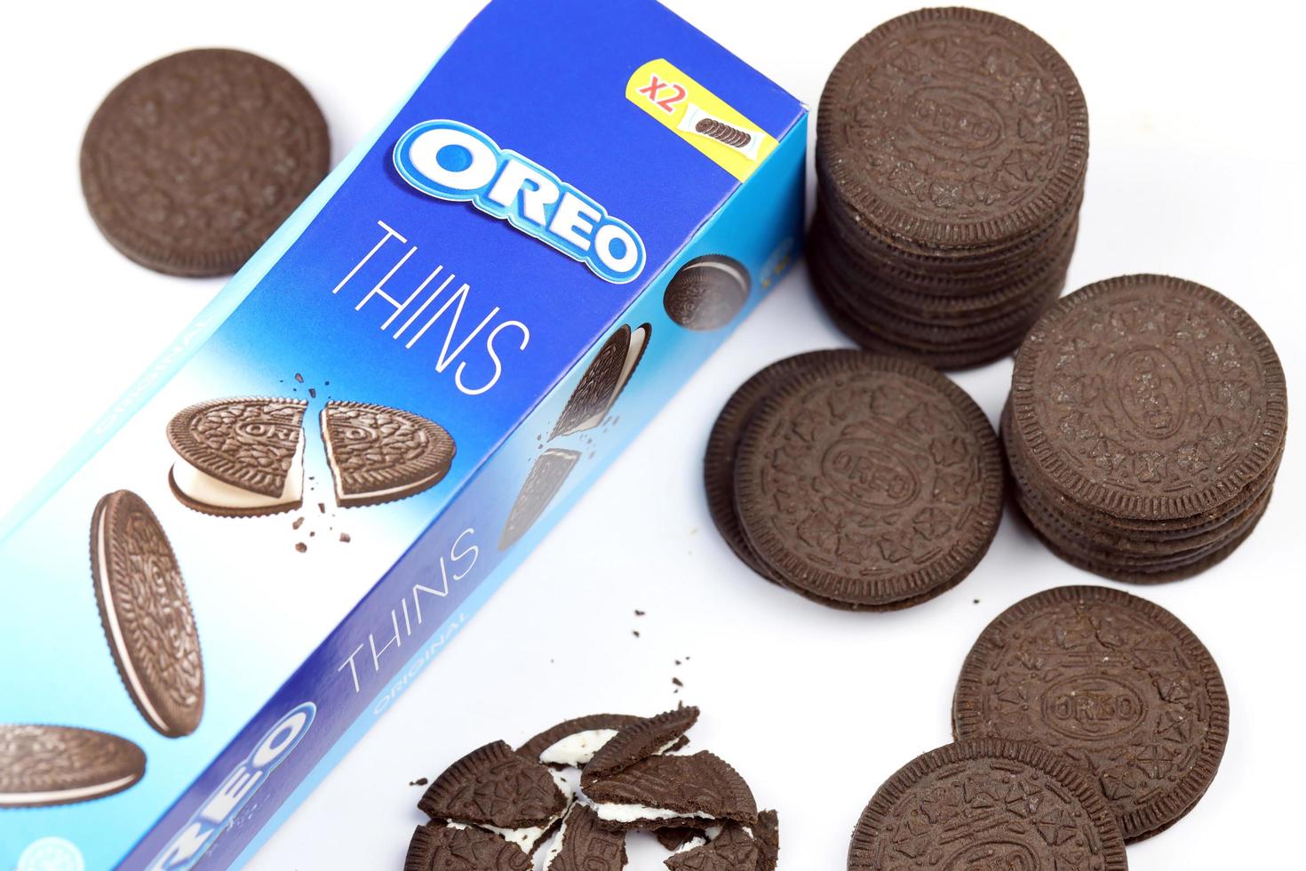 KHARKIV, UKRAINE - FEBRUARY 14, 2021 Oreo thins crispy cookies pack. The brand Oreo is owned by company Mondelez international photo