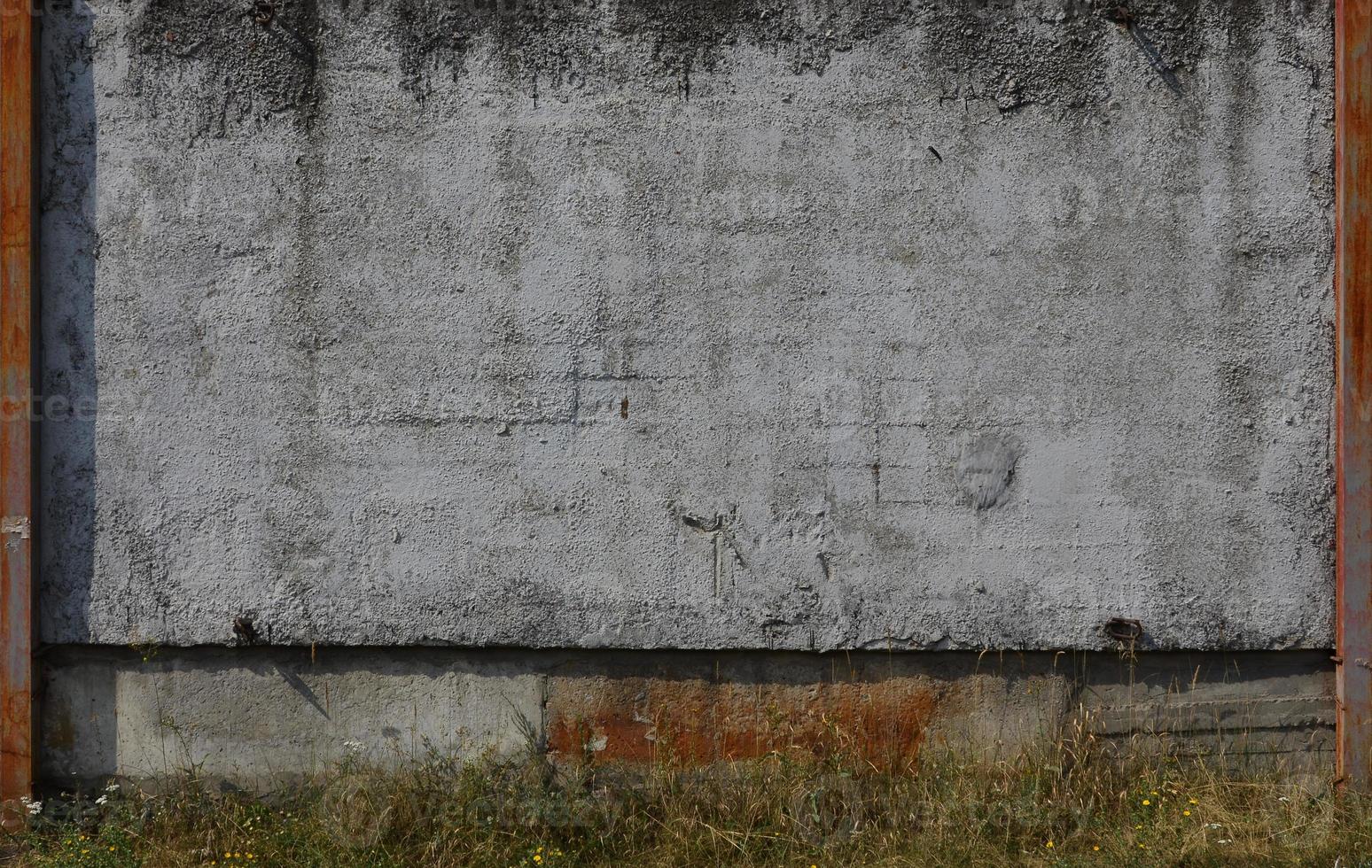 textura de la antigua pared de hormigón en relieve de color gris. imagen de fondo de un producto concreto foto