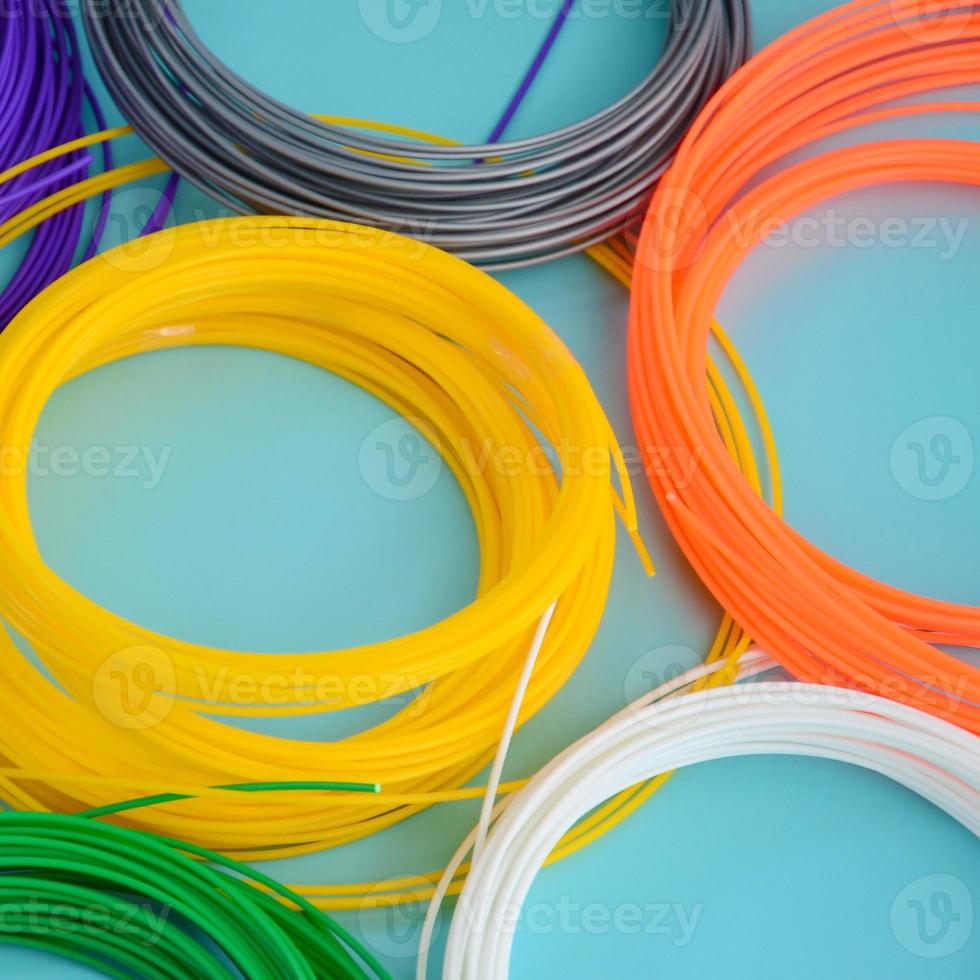 Plastic PLA and ABS filament material for printing on a 3D pen or printer of various colors photo