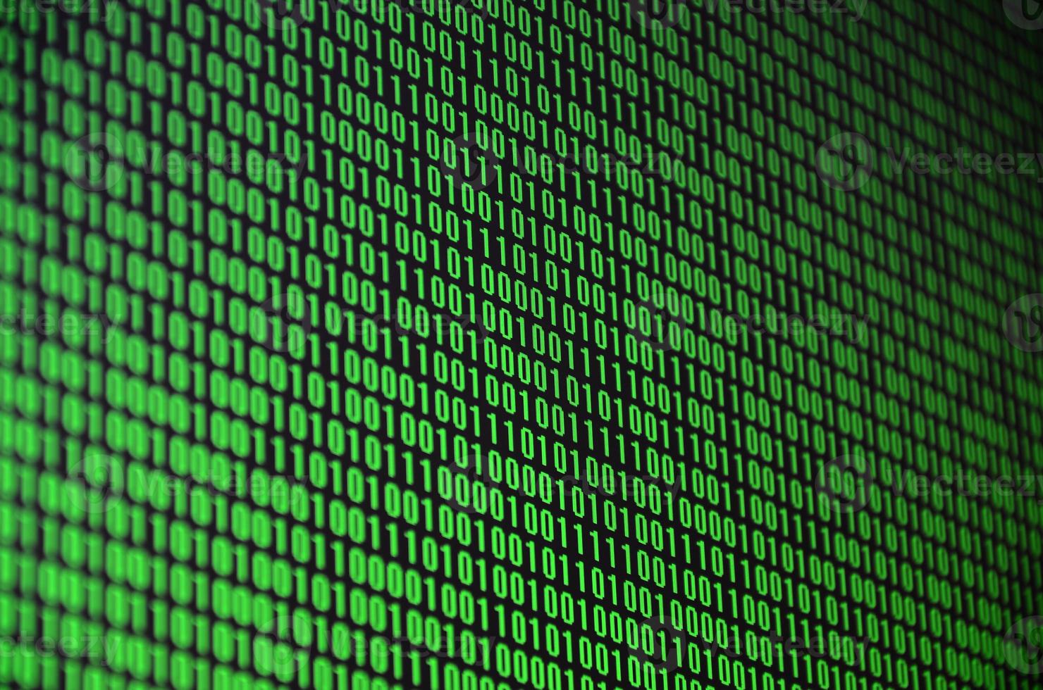 An image of a binary code made up of a set of green digits on a black background photo