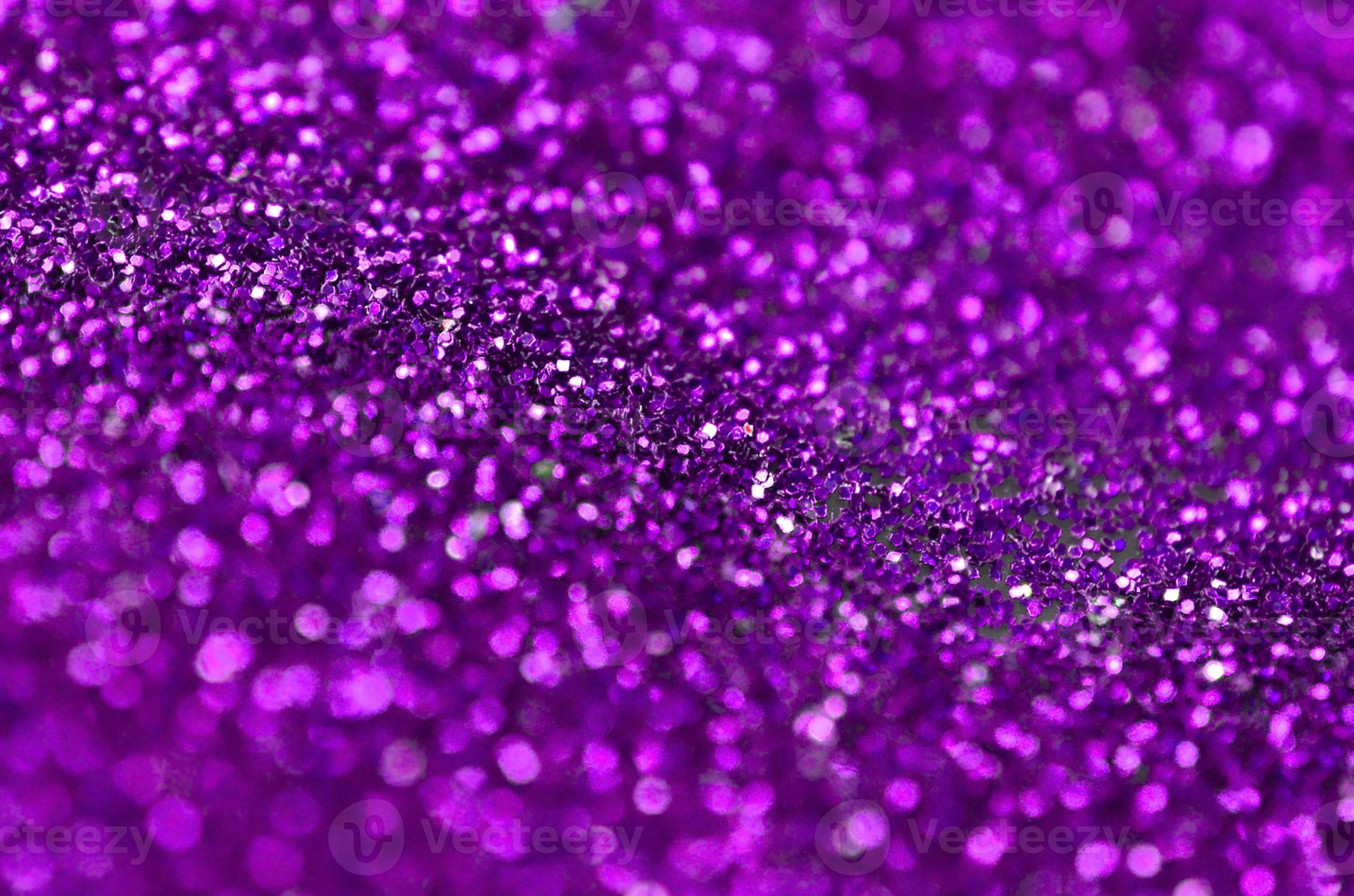 Purple decorative sequins. Background image with shiny bokeh lights