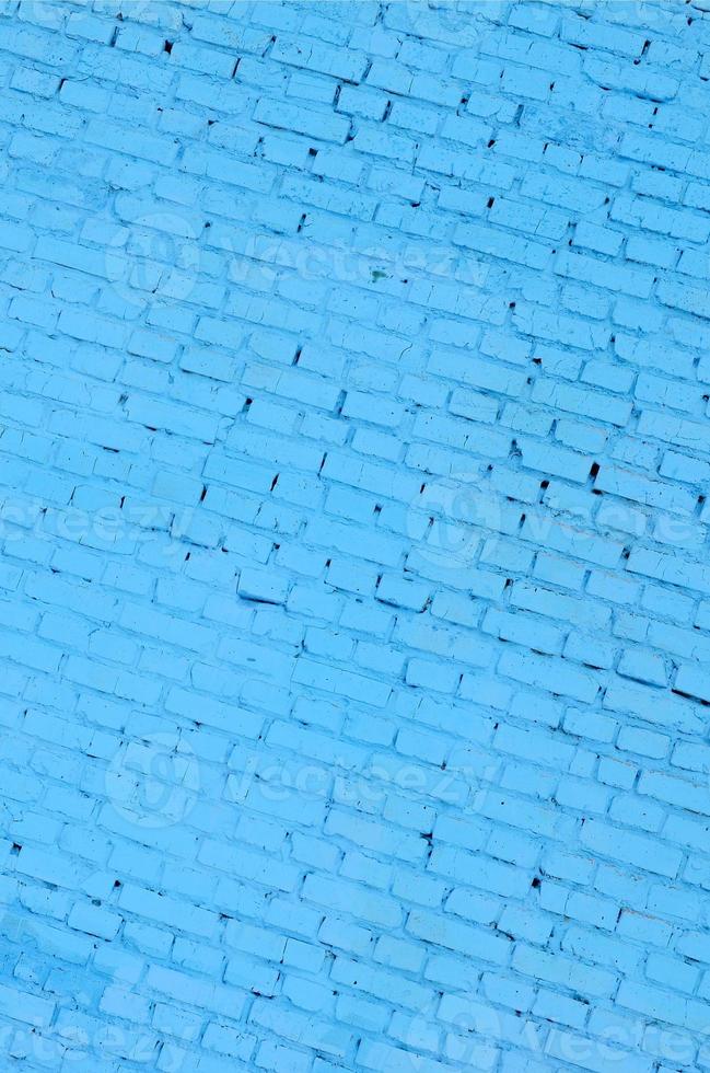 Square brick block wall background and texture. Painted in blue photo