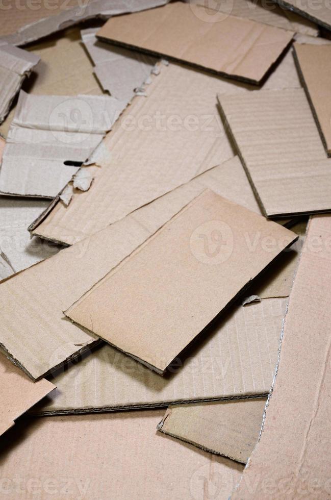 Background of paper textures piled ready to recycle. A pack of old office cardboard for recycling of waste paper. Pile of wastepaper photo