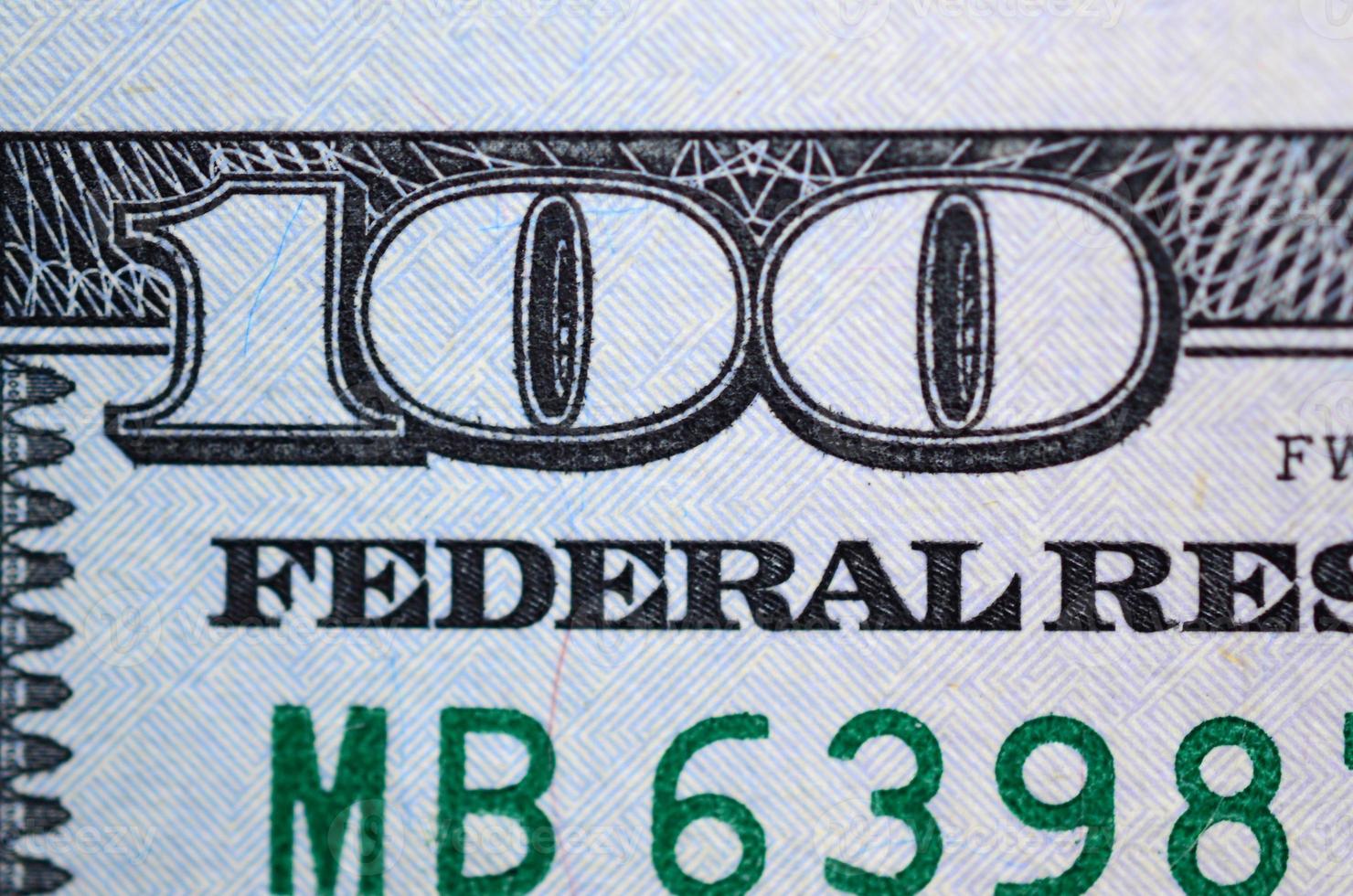 Macro shot. Hundred US dollar bill close up photo