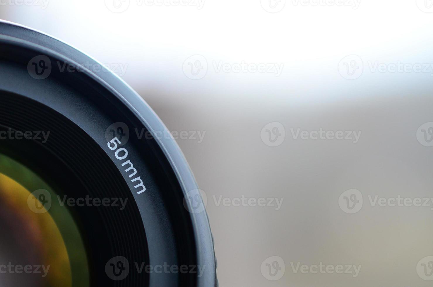 Fragment of a portrait lens for a modern SLR camera. A photograph of a wide-aperture lens with a focal length of 50mm photo