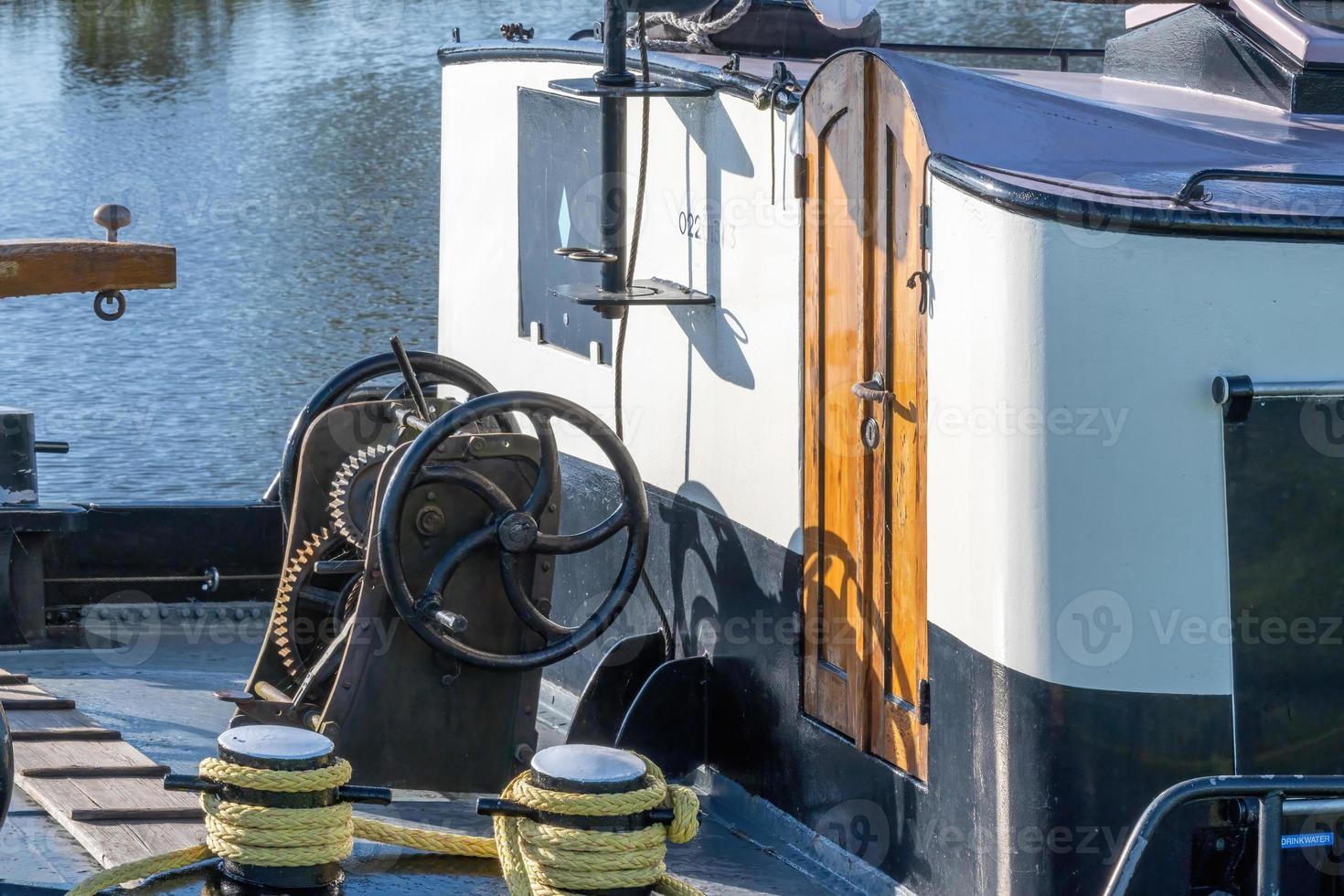 part of boat in harbor photo