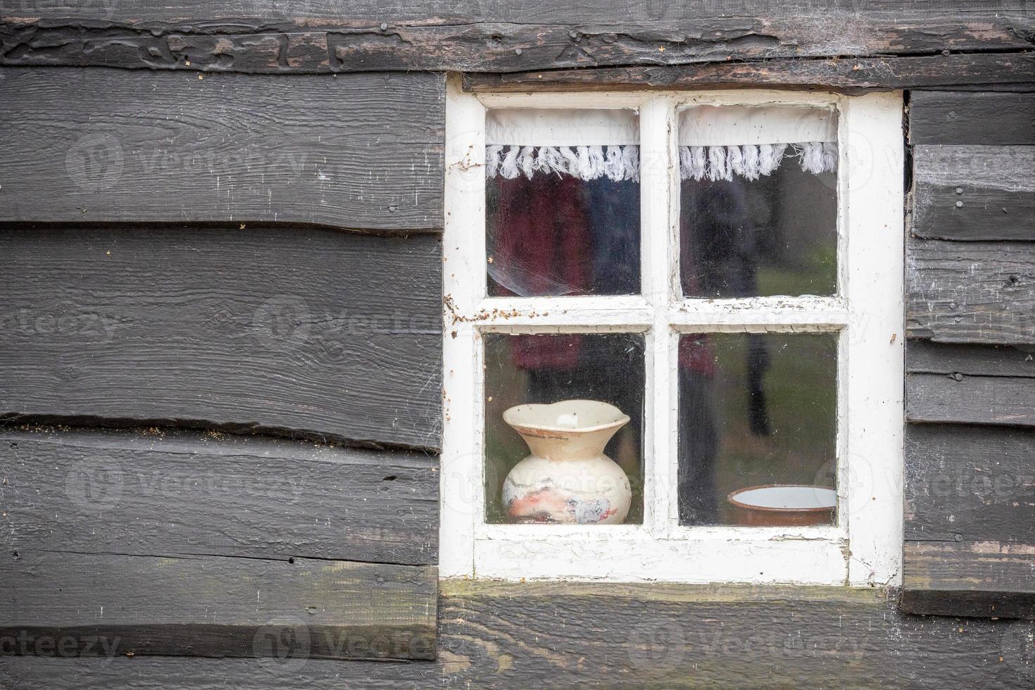 old window in old house photo