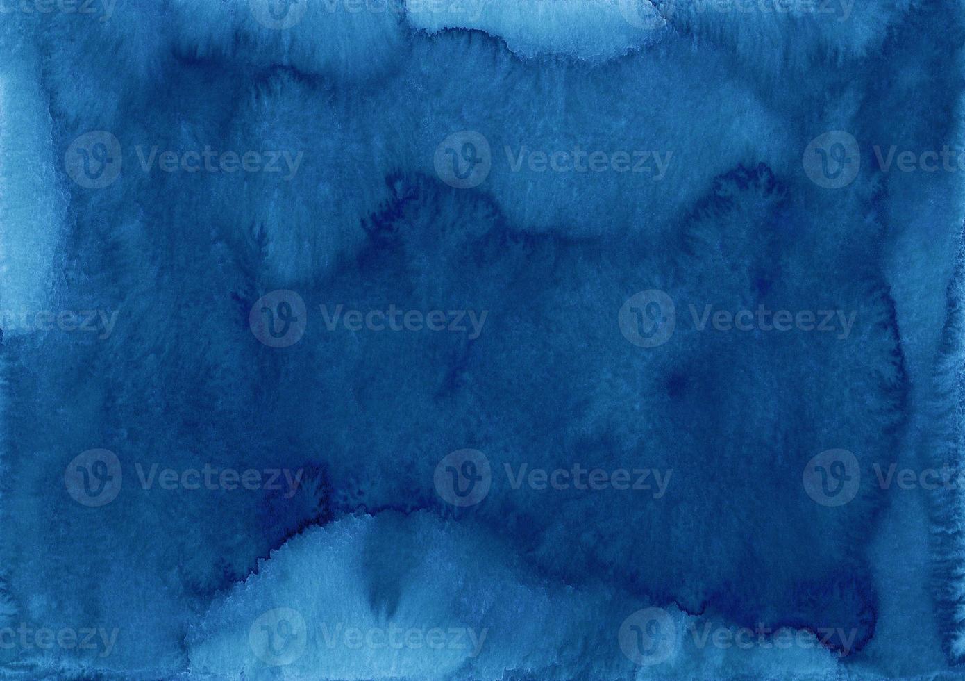Watercolor dark blue background texture. Navy blue stains on paper, hand painted. photo