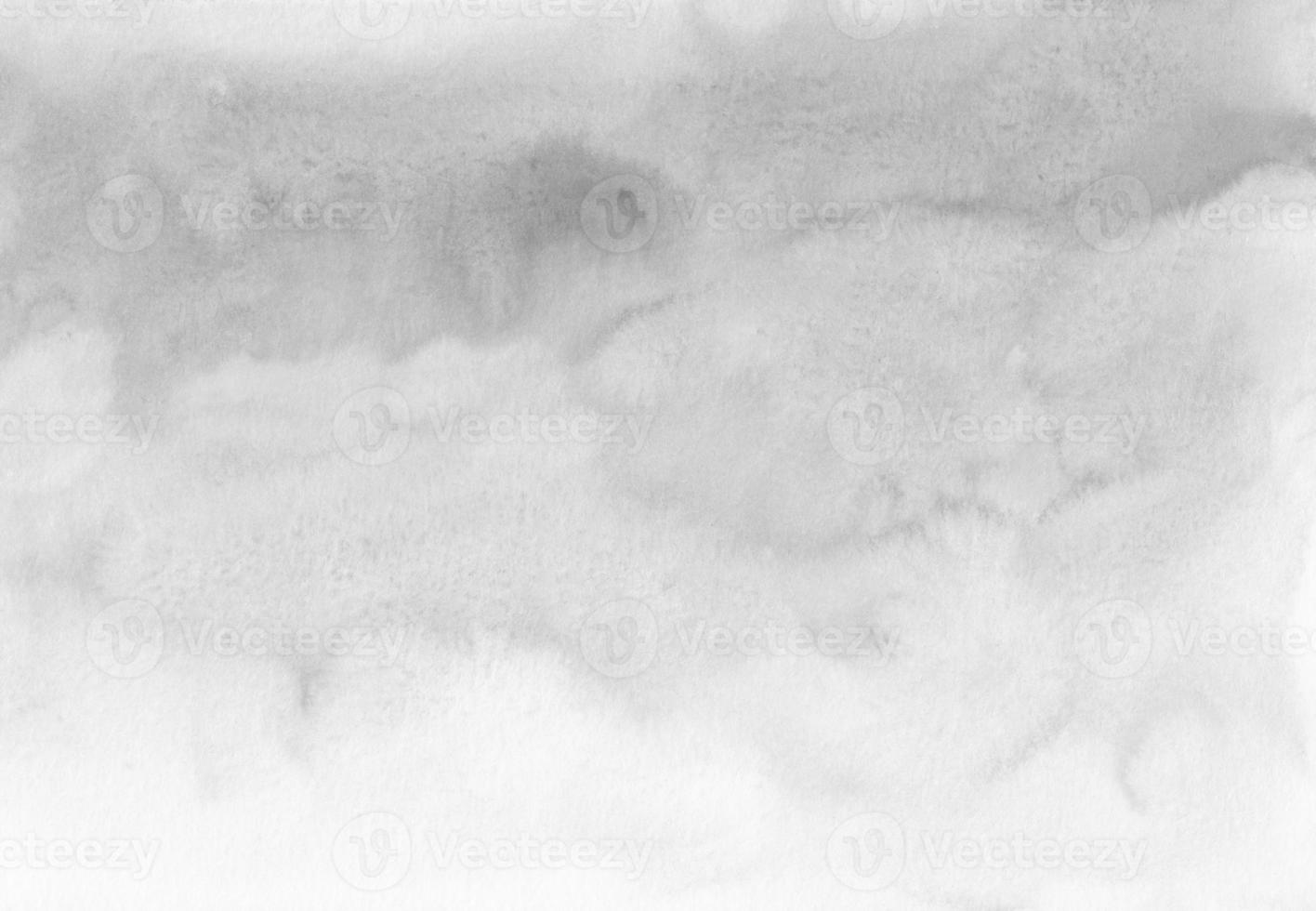 Watercolor grey and white ombre background. Light gray gradient backdrop, stains on paper. Monochrome painting wallpaper. photo