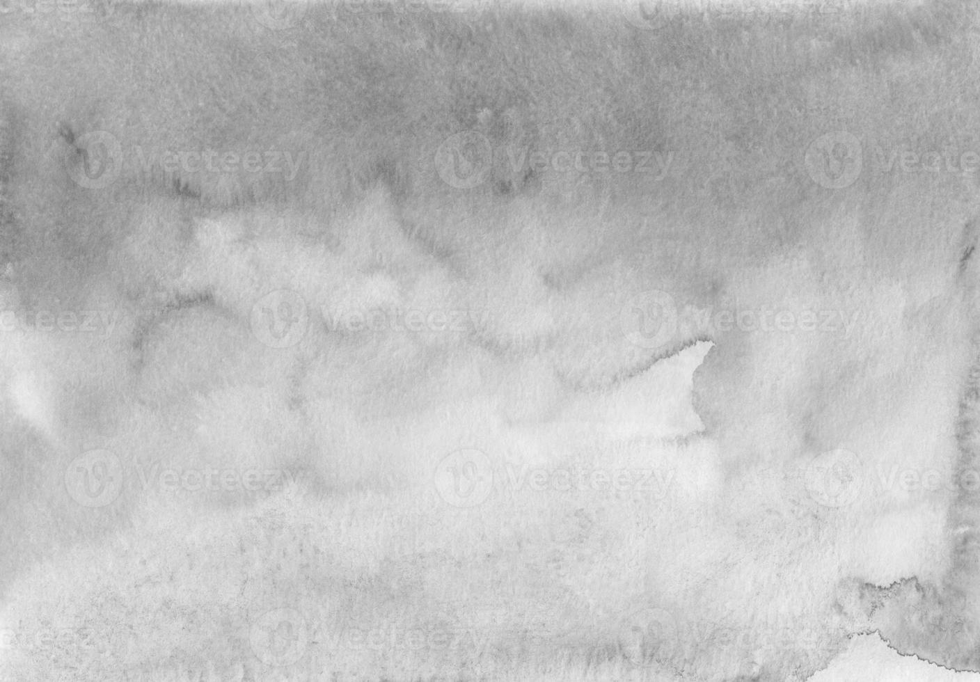 Watercolor calm grey ombre background, stains on paper. photo